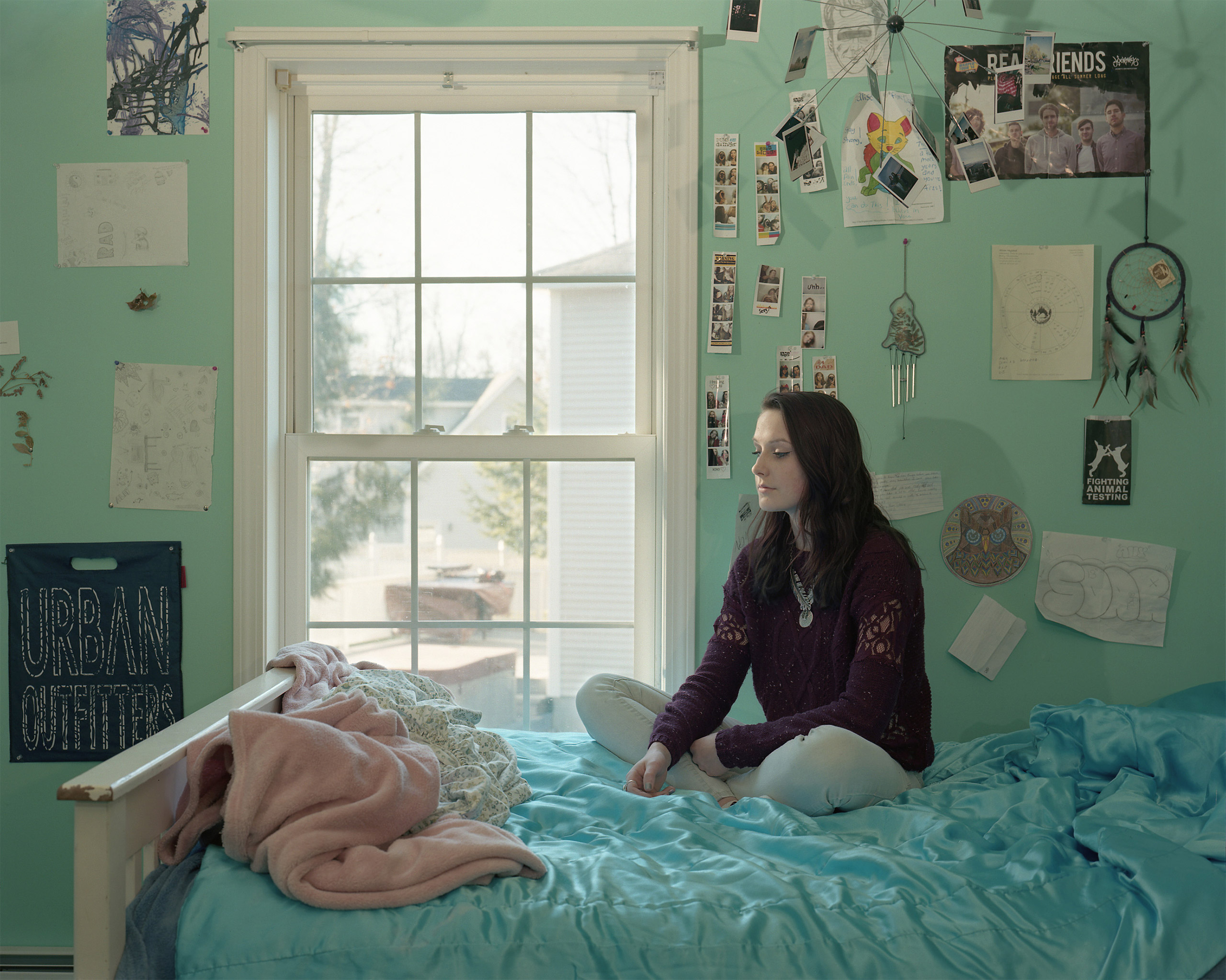 Alison Heyland, 18, appears in her bedroom at home in Saco, ME on January 11, 2016.