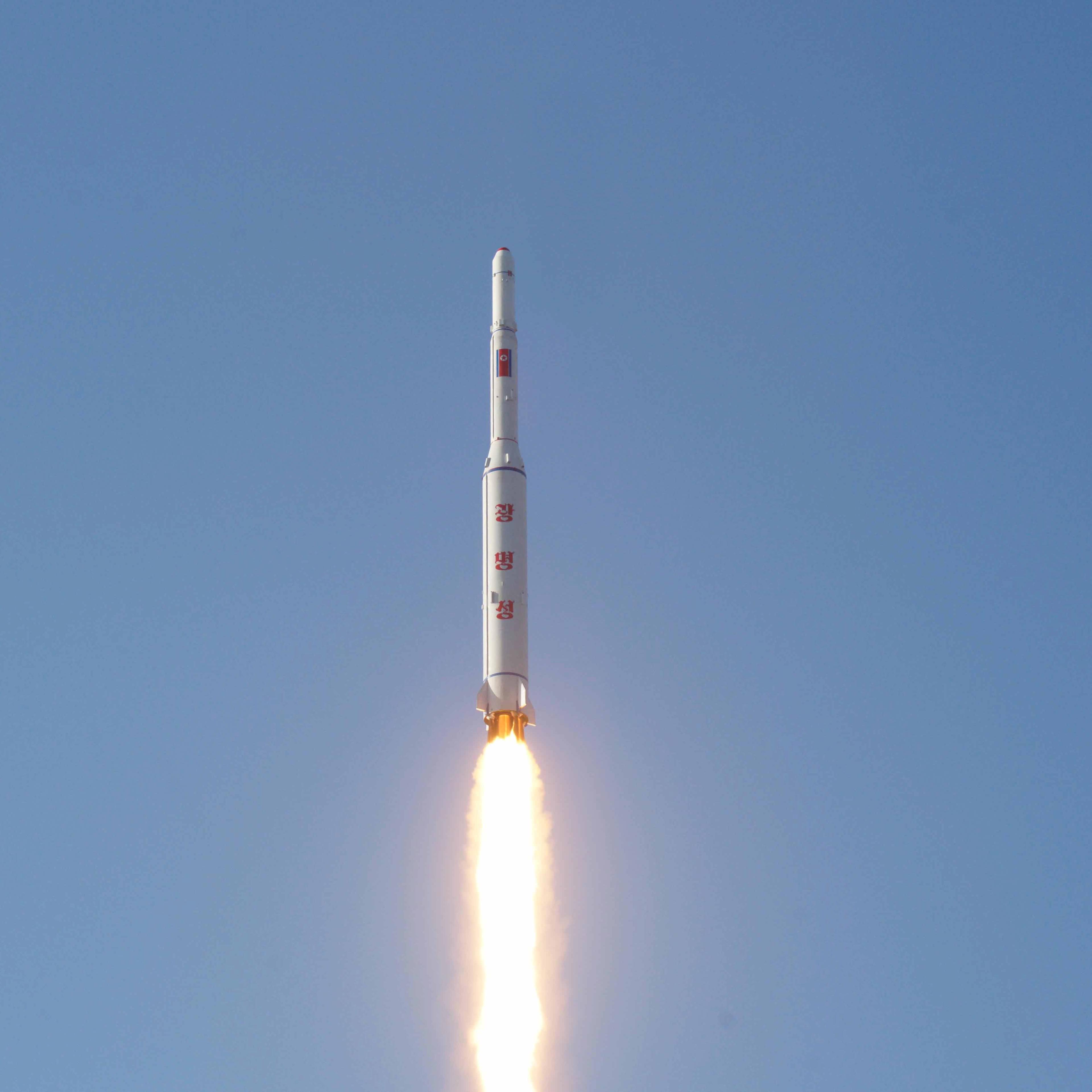 A North Korean long-range rocket is launched into the air at the Sohae rocket launch site in this undated photo released by North Korea's Korean Central News Agency (KCNA) in Pyongyang