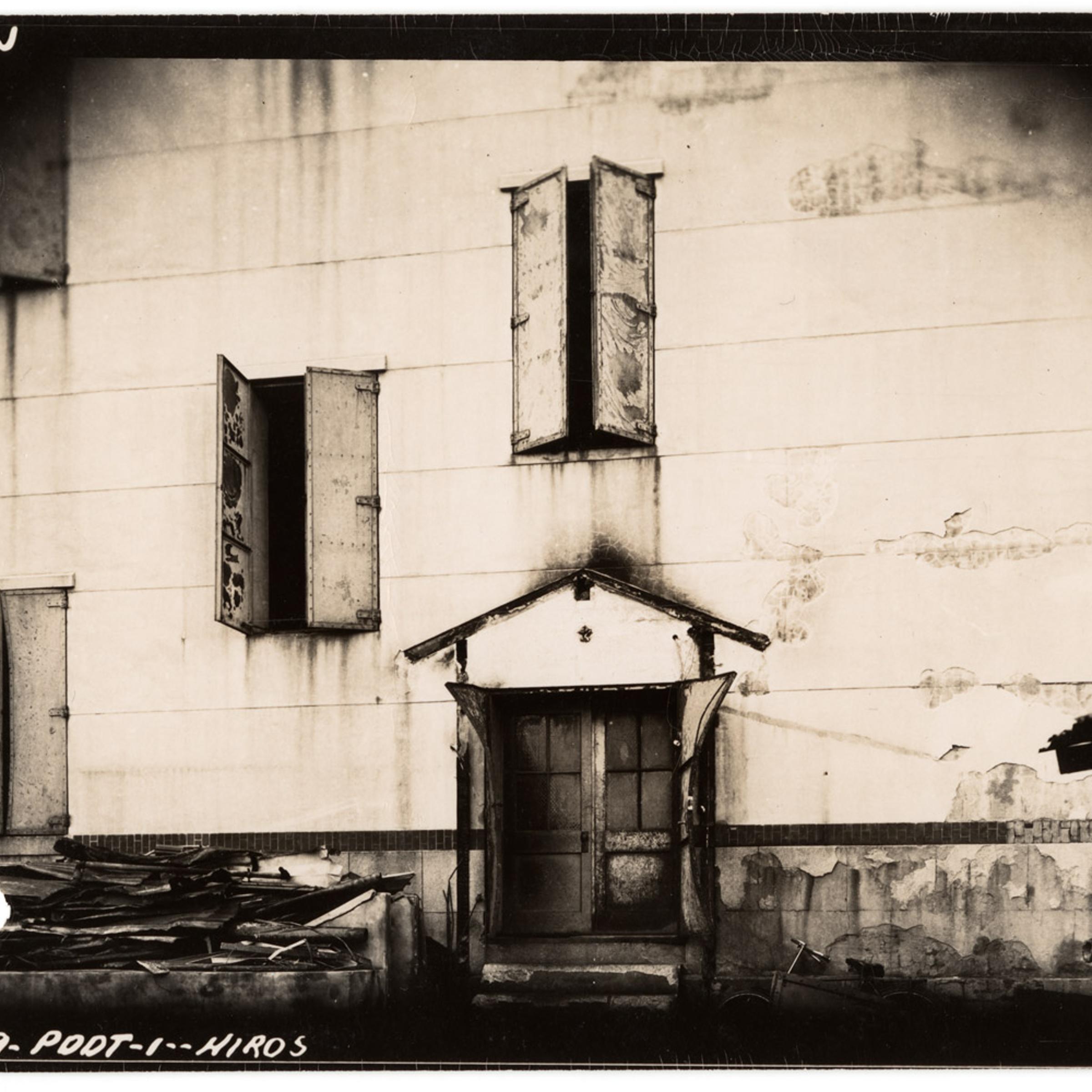 <b>November 17, 1945</b><br>
The Higashi Matsurara branch of the Sumitomo Bank Company had metal and wire-glass doors which stopped the fire from spreading into the building.