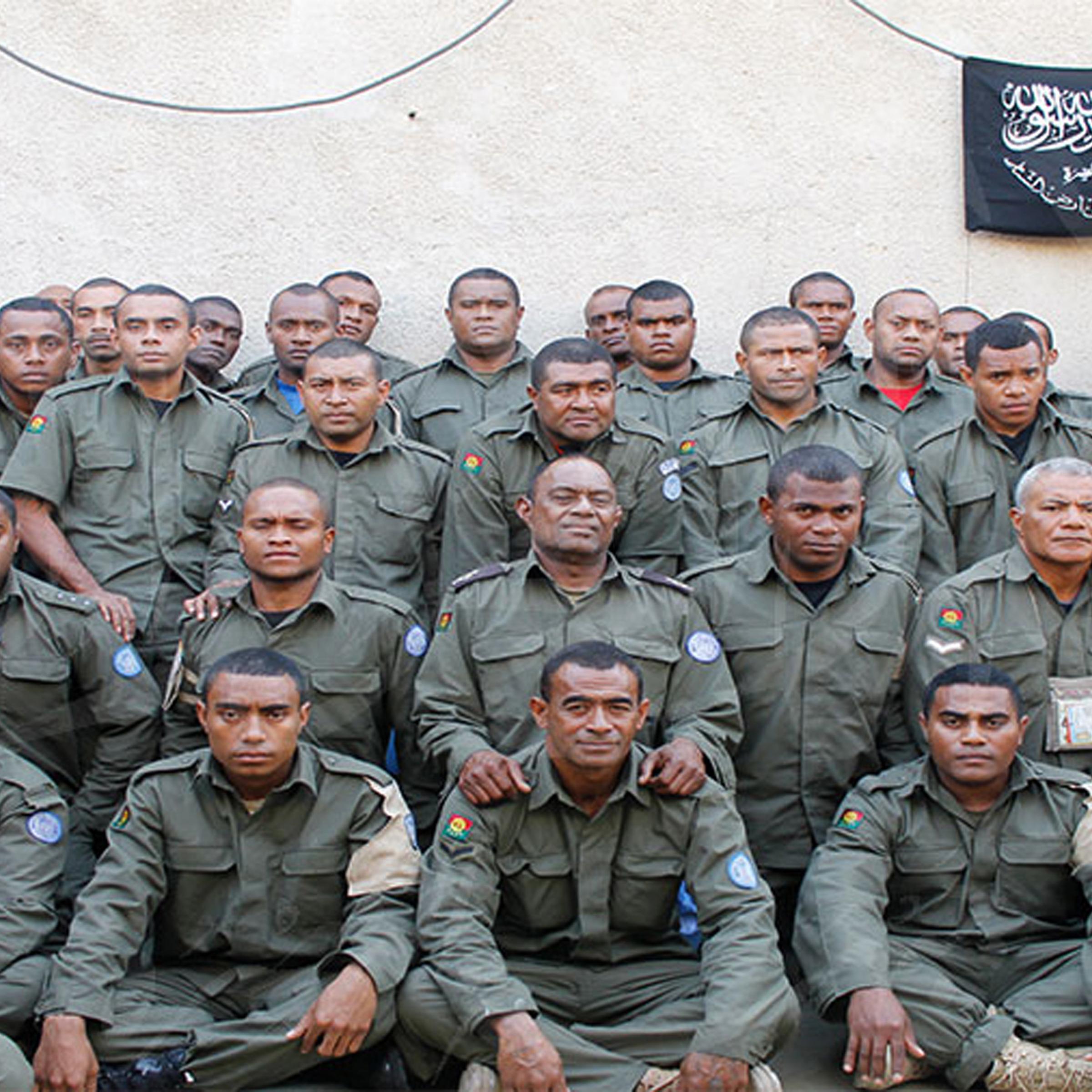 Undated photograph released by Hanin Network, a militant website, shows Fijian UN peacekeepers who were seized by The Nusra Front on Aug. 28, 2014, in the Golan Heights.