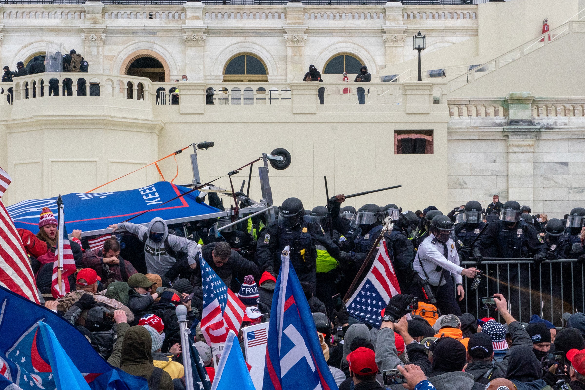 2020.Washington DC. USA. Protestors clash with police before gaining entry to the capitol. Following an inflammatory speech by President Trump, protestors objecting to the certification of Joe Biden by Congress storm the Capitol. They were briefly blocke