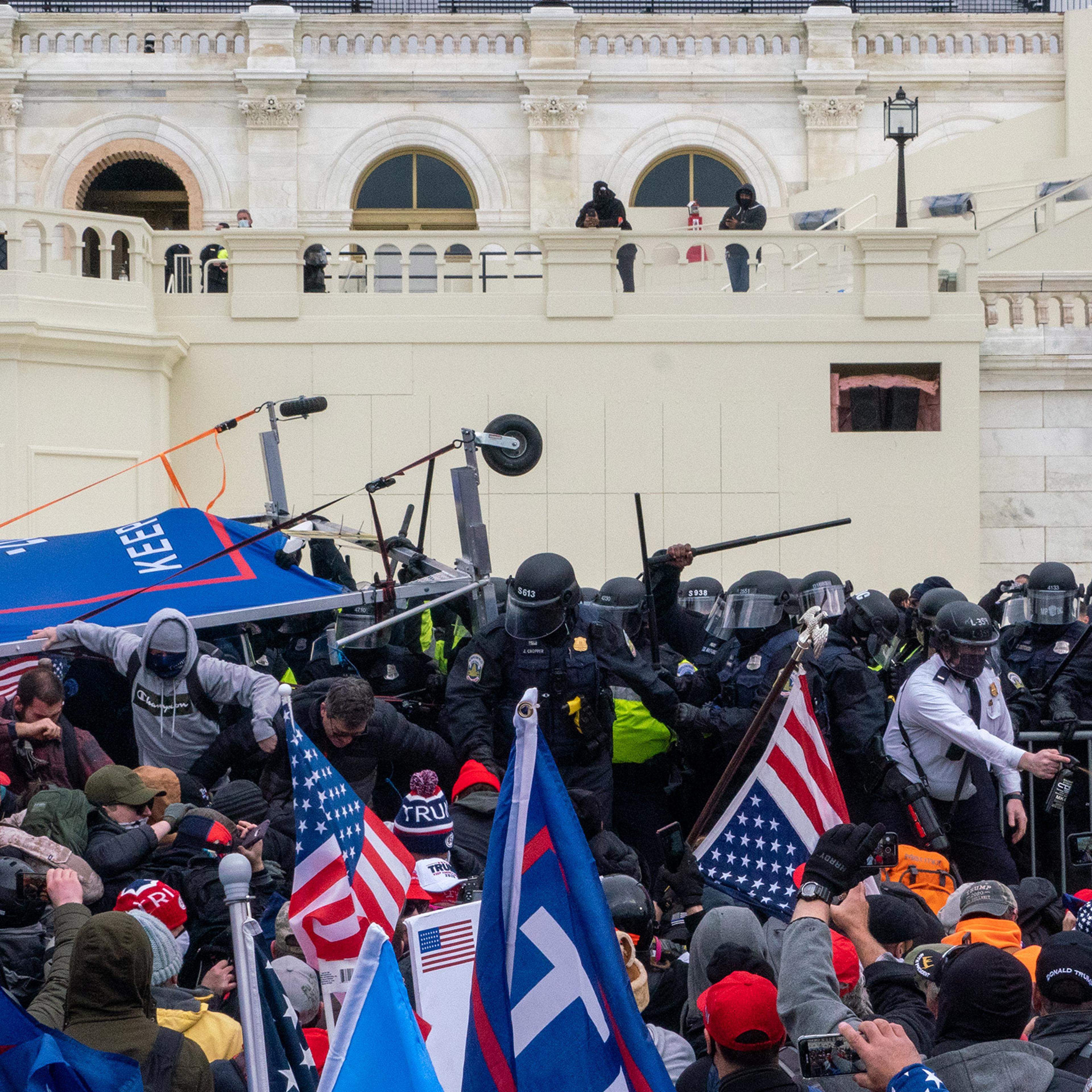 2020.Washington DC. USA. Protestors clash with police before gaining entry to the capitol. Following an inflammatory speech by President Trump, protestors objecting to the certification of Joe Biden by Congress storm the Capitol. They were briefly blocke