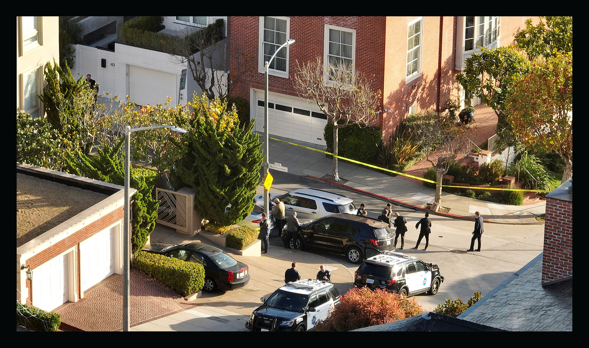 In an aerial view, San Francisco police officers and F.B.I. agents gather in front of the home of U.S. Speaker of the House Nancy Pelosi on Oct. 28, 2022 in San Francisco.