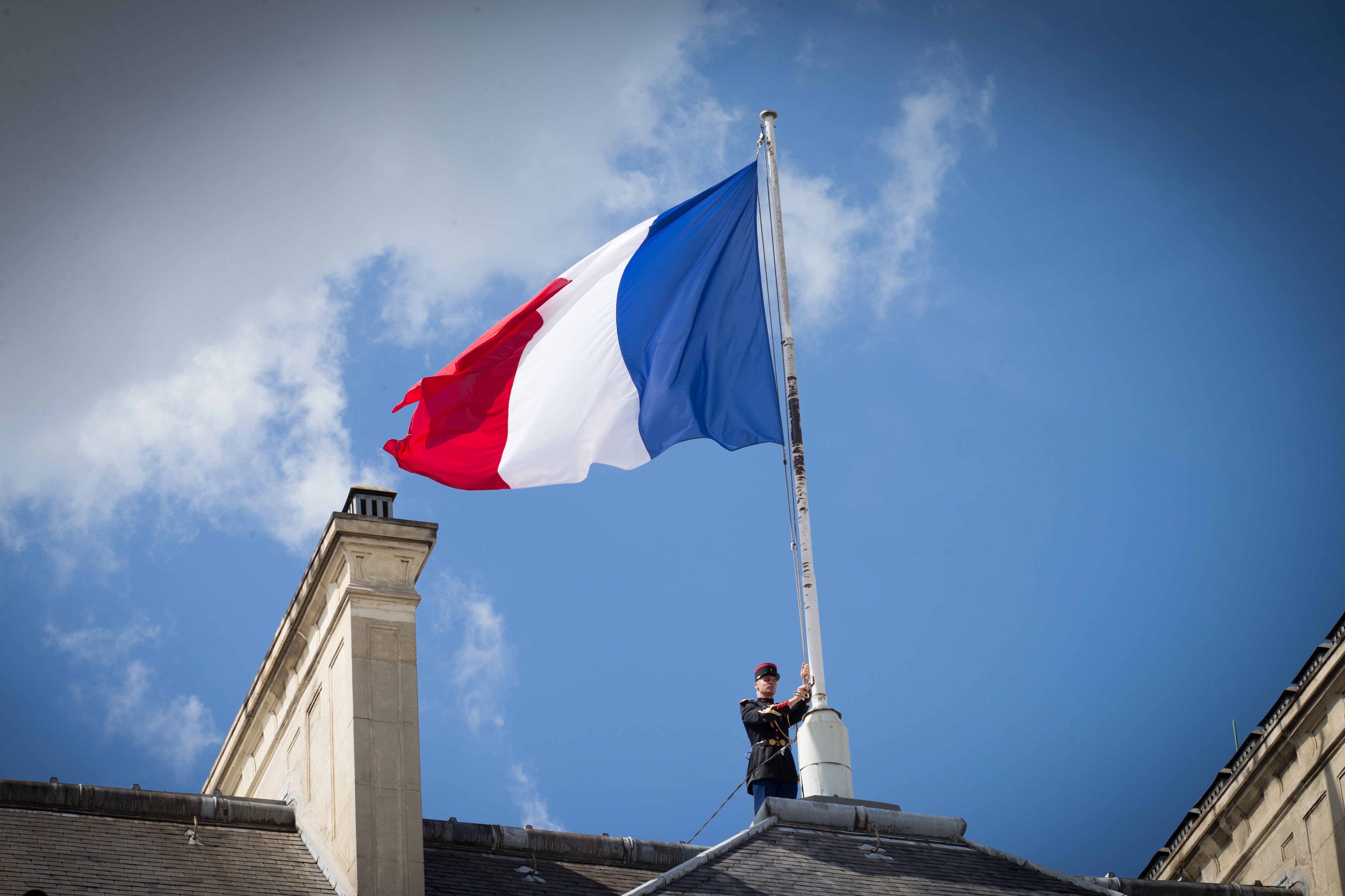 The French flag is at half mast after a Security and Defense Council, chaired by French President Francois Hollande at the Elysee Palace on July 15, 2016 in Paris, France.