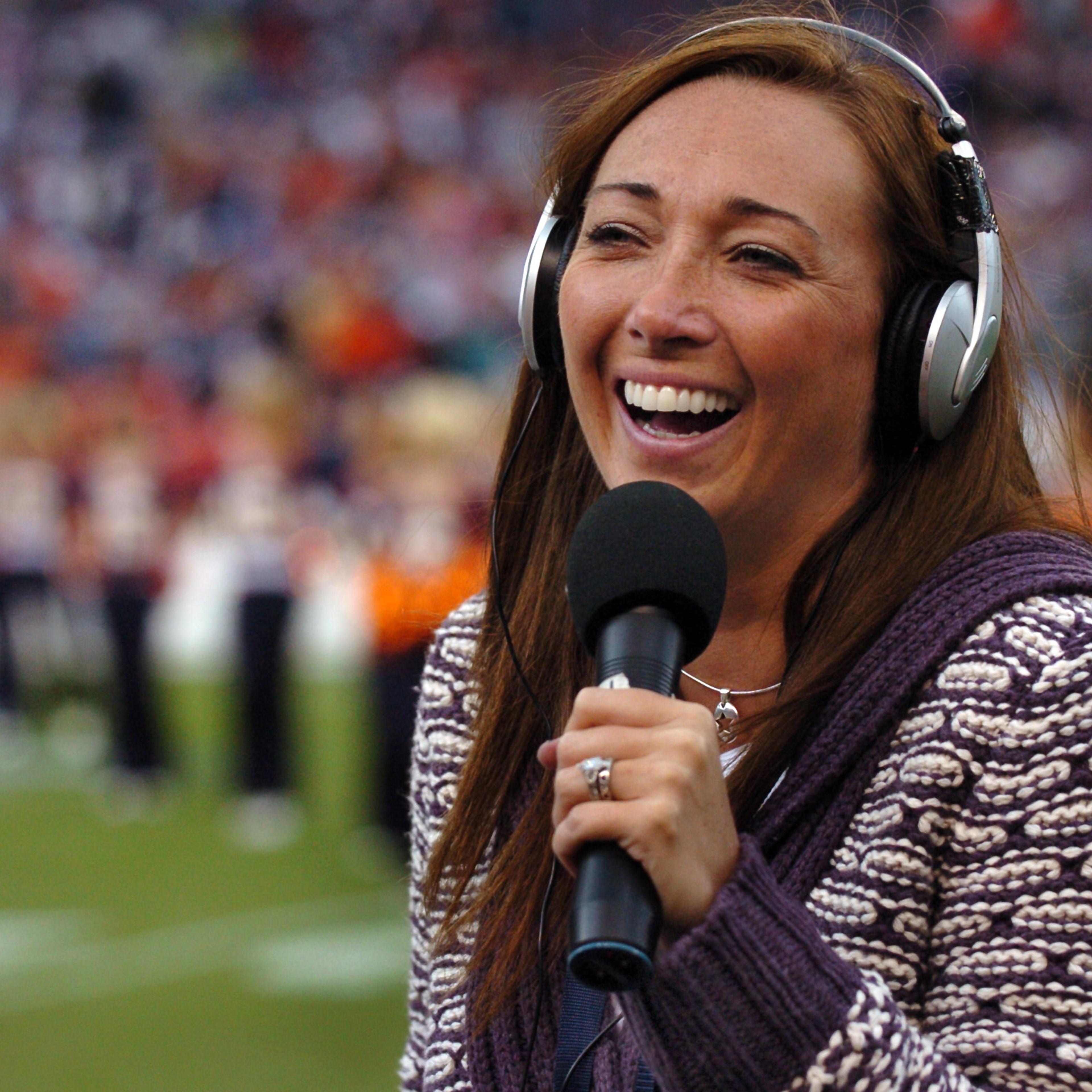 Denver Broncos side line reporter for 850 KOA Amy Van Dyken. Reporting on the Broncos vs the San Diego Chargers on Sunday, October 7th, 2007 at Invesco Field. Andy Cross / The Denver Post