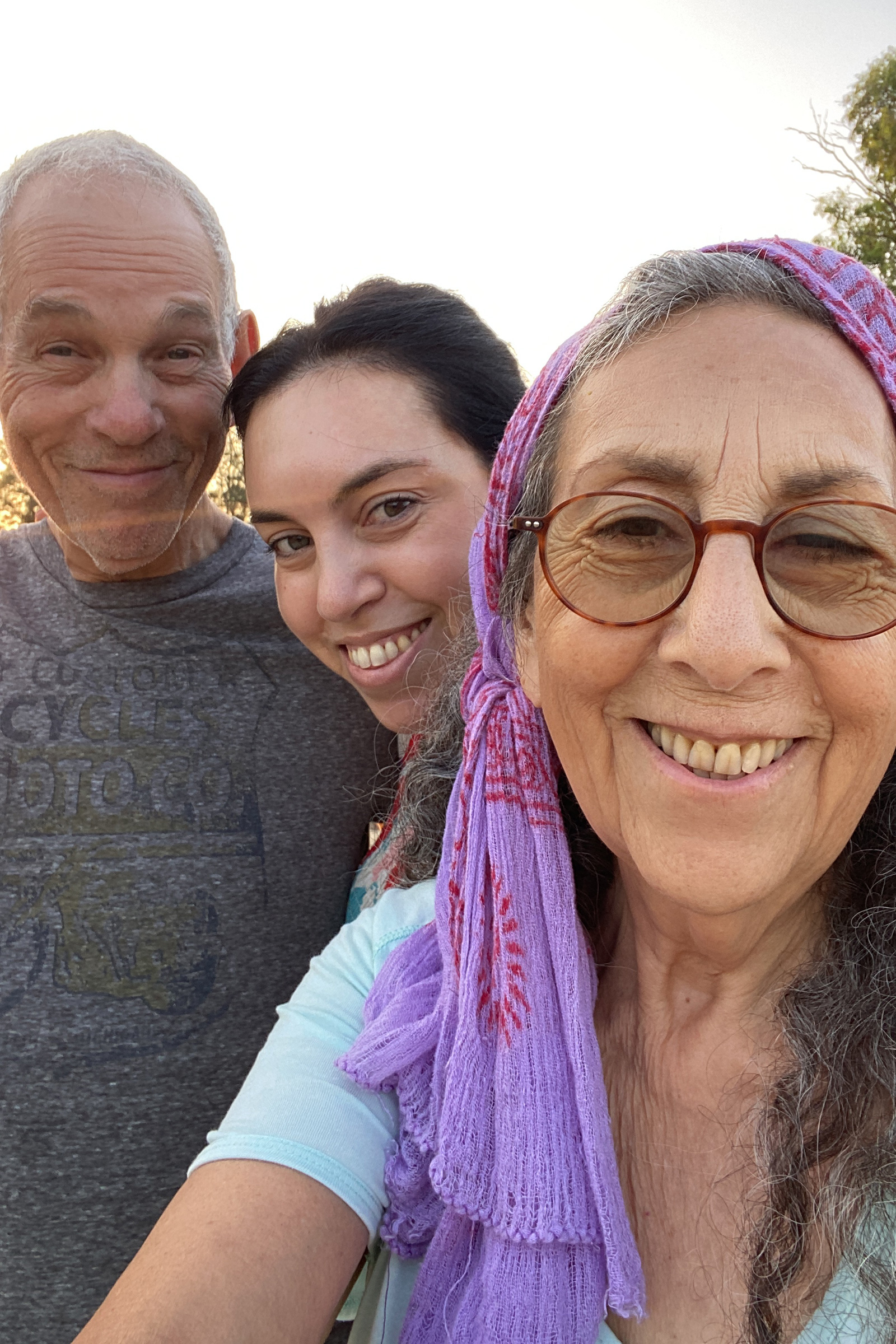 Iris Weinstein Haggai, center, with her parents