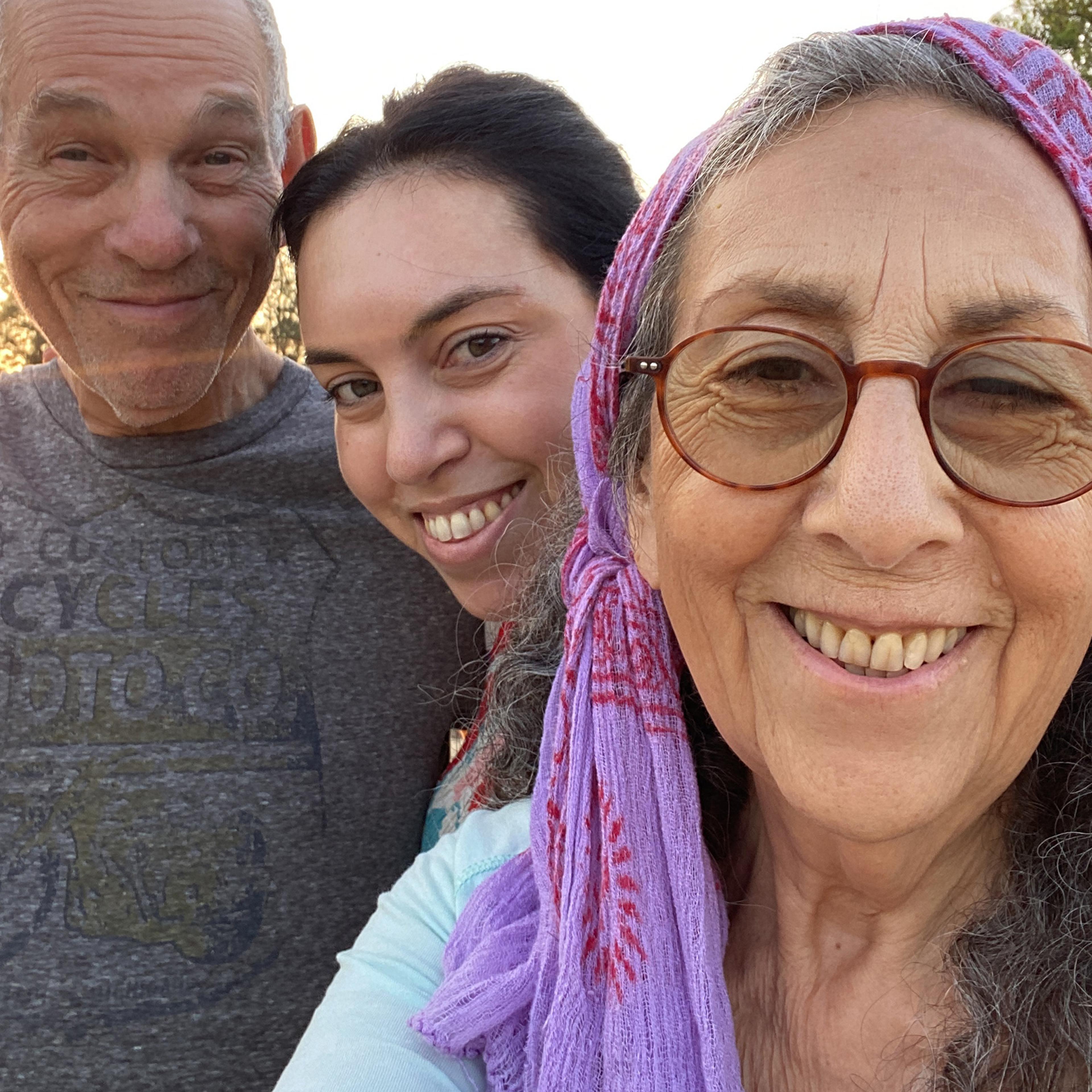 Iris Weinstein Haggai, center, with her parents