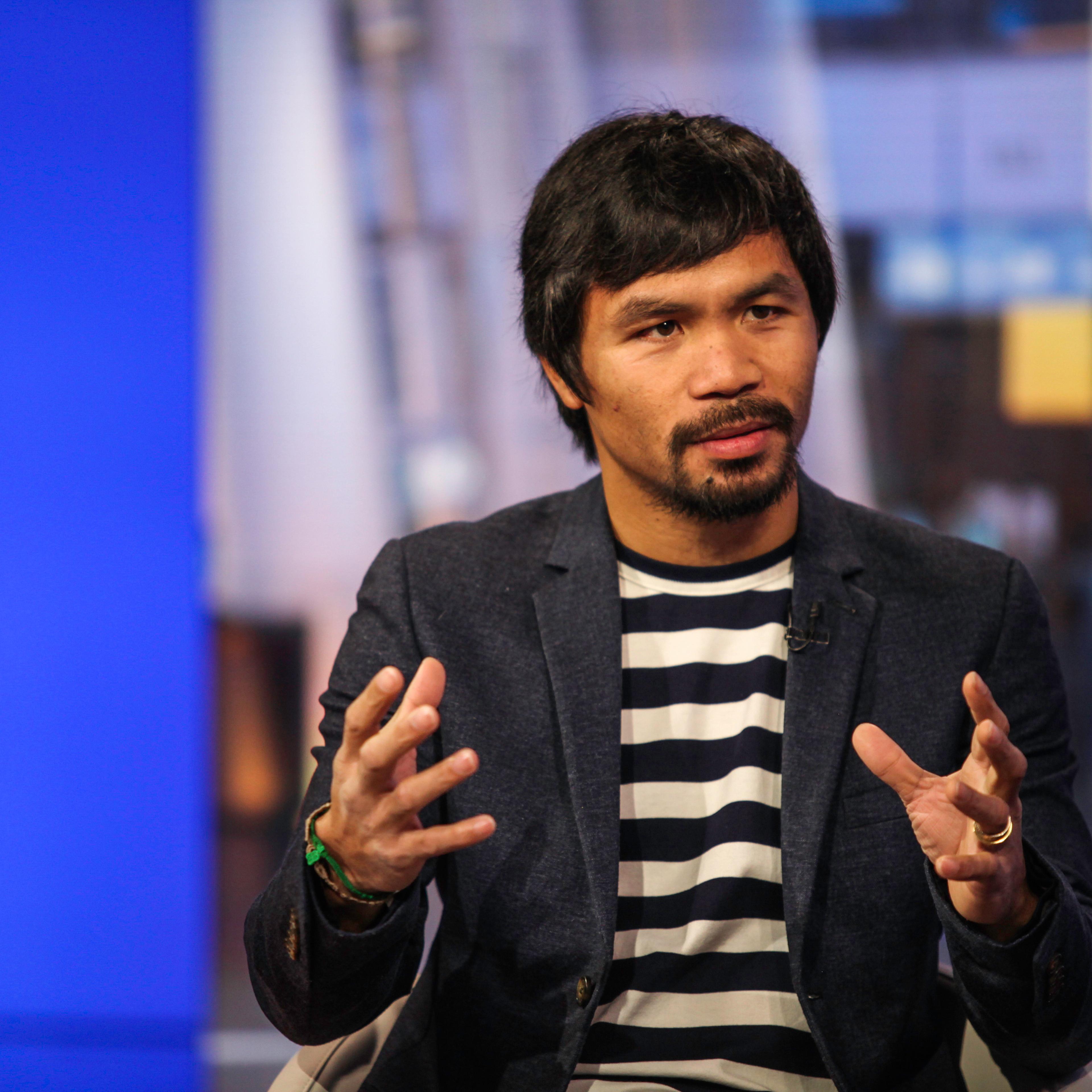 Professional boxer Manny Pacquiao speaks during a Bloomberg Television interview in New York, U.S., on Tuesday, Oct. 13, 2015. Pacquiao discussed his career as a boxer and politician and what motivates him to do charity work. Photographer: Chris Goodney/