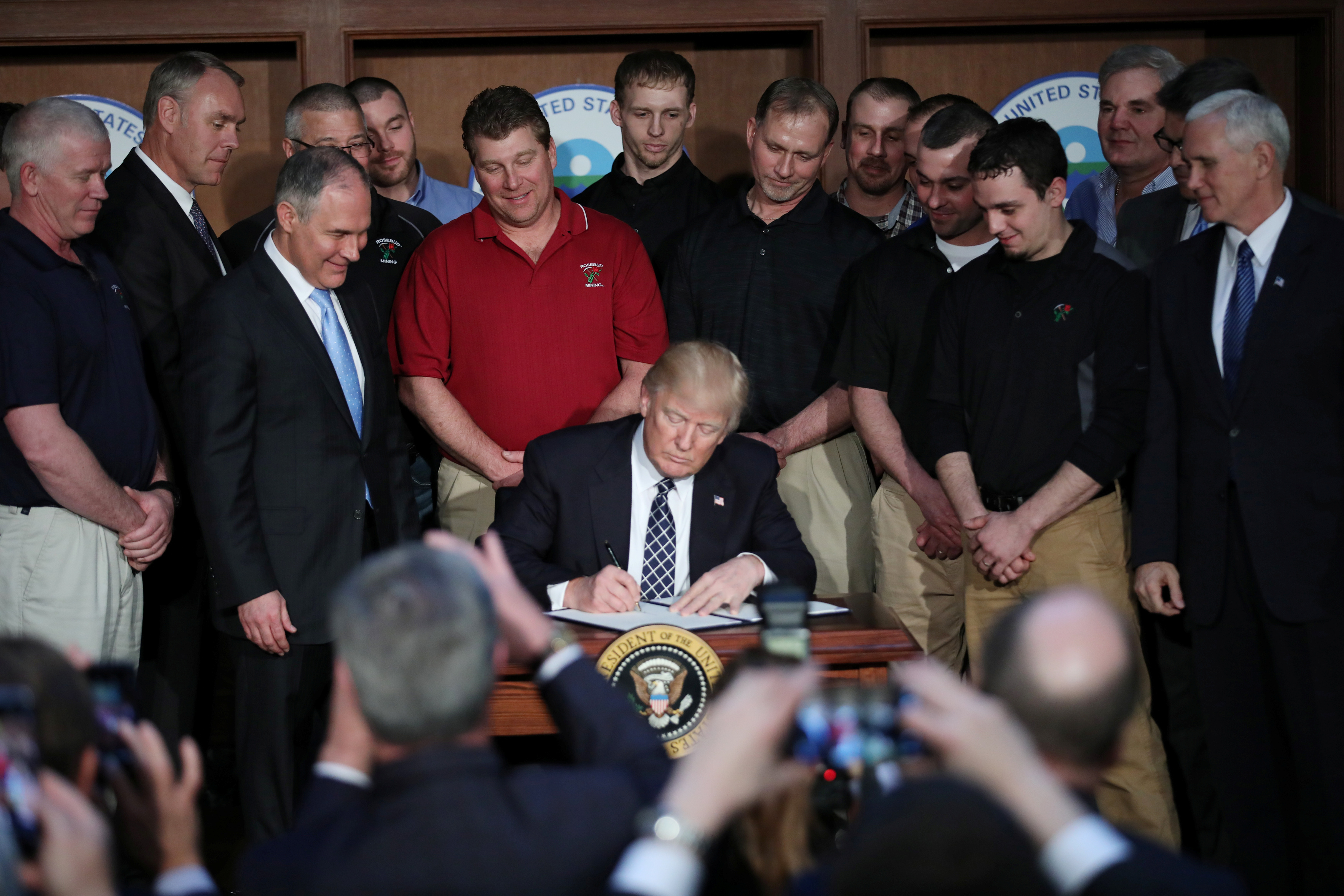 U.S. President Trump signs an executive order on "energy independence" during event at EPA headquarters in Washington