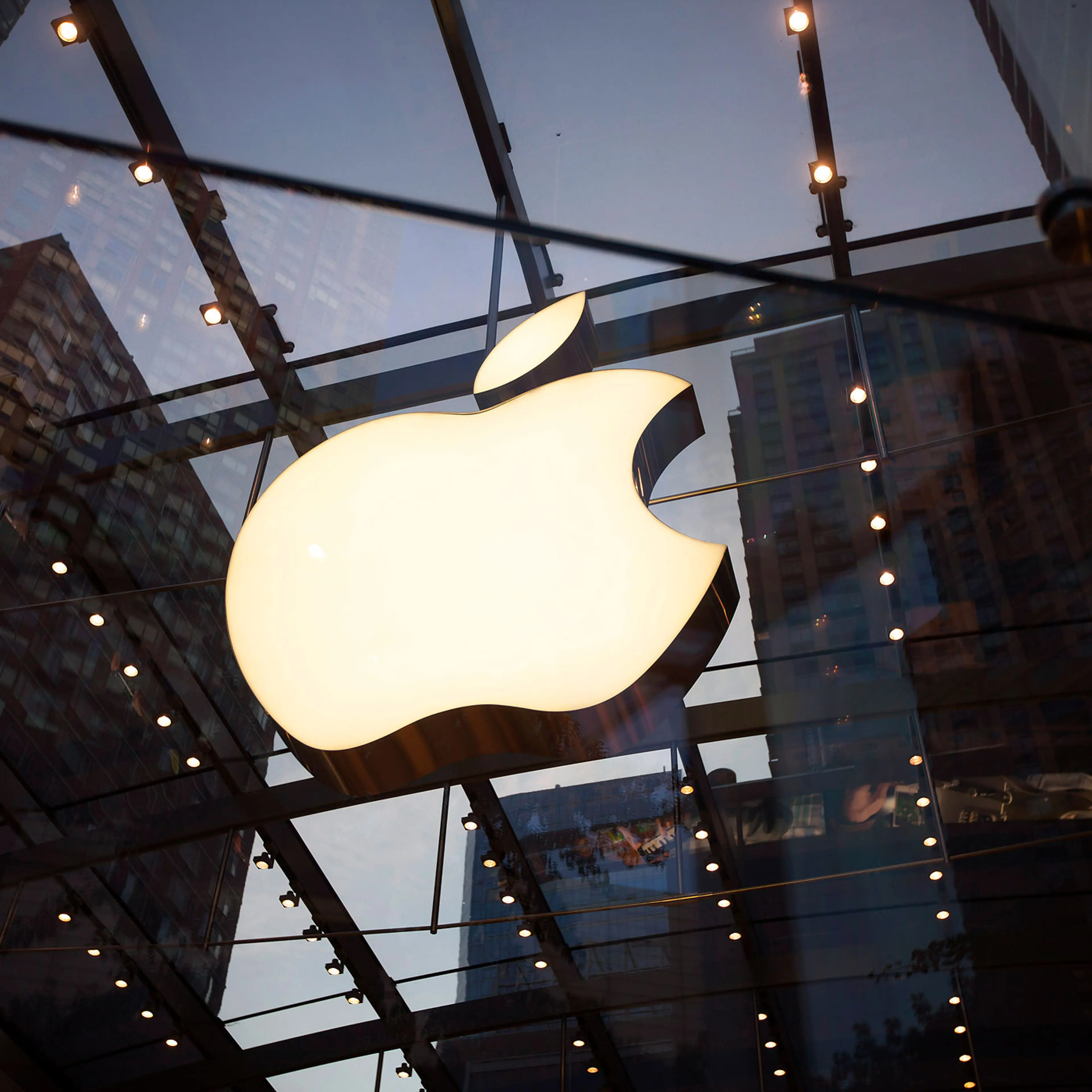 Consumers Shop At An Apple Inc. Store Ahead Of Earnings Figures