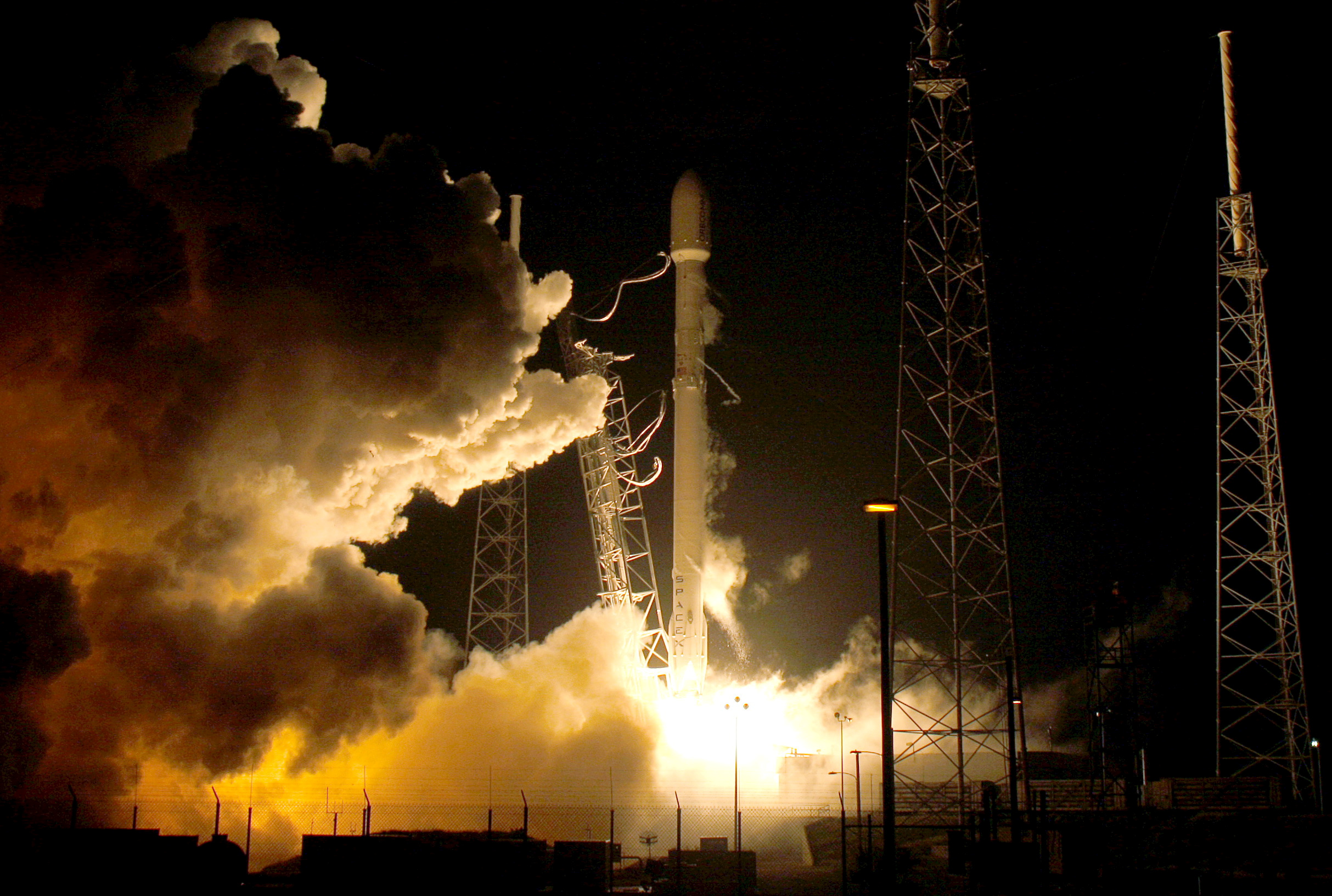 FILE PHOTO:  A SpaceX Falcon 9 rocket lifts off  at the Cape Canaveral Air Force Station in Cape Canaveral