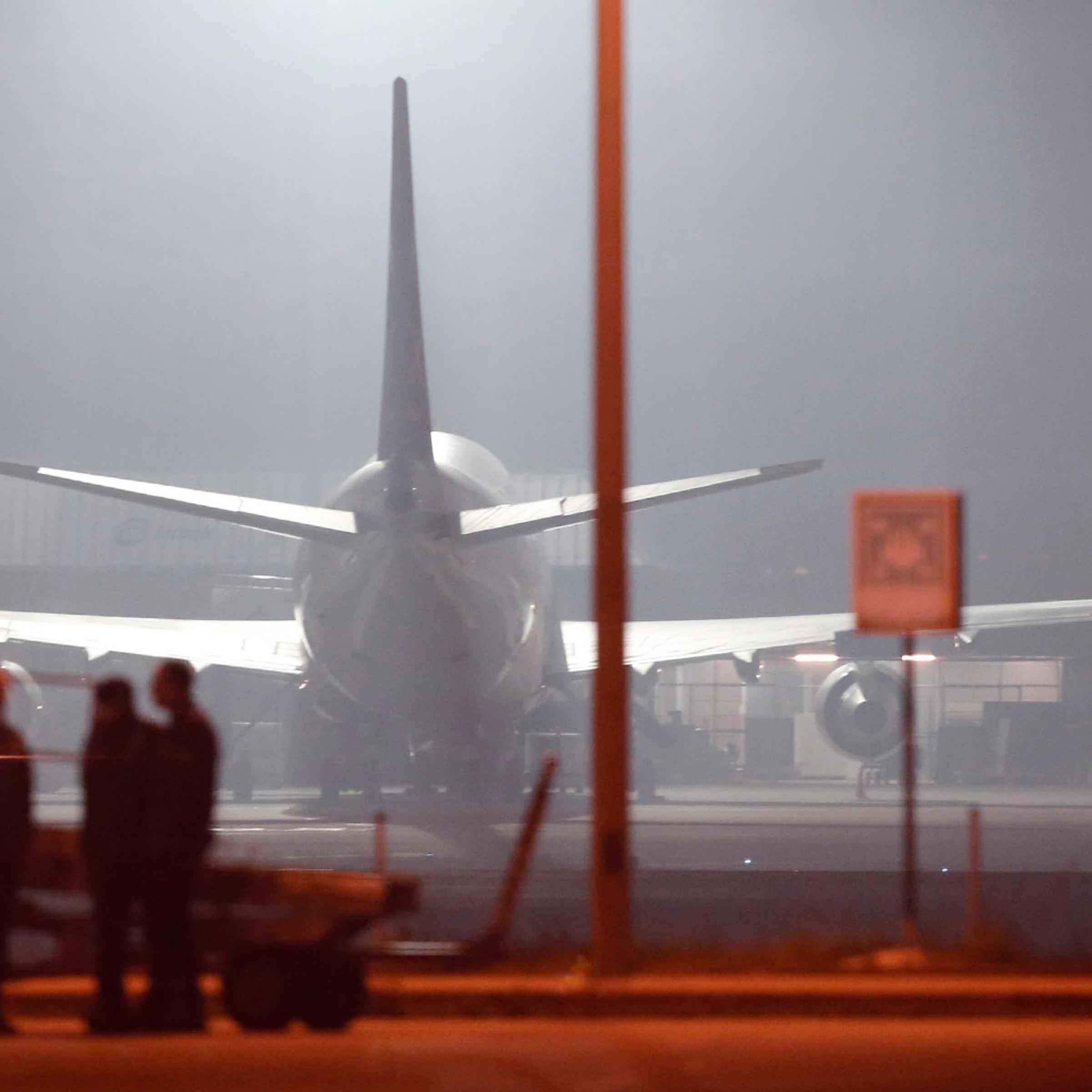 Turkish police forces arrive at the scene after hijacked airplane of a Turkish company Pegasus Airlines was landed at Sabiha Gokcen Airport in Istanbul, on Feb. 7, 2014.