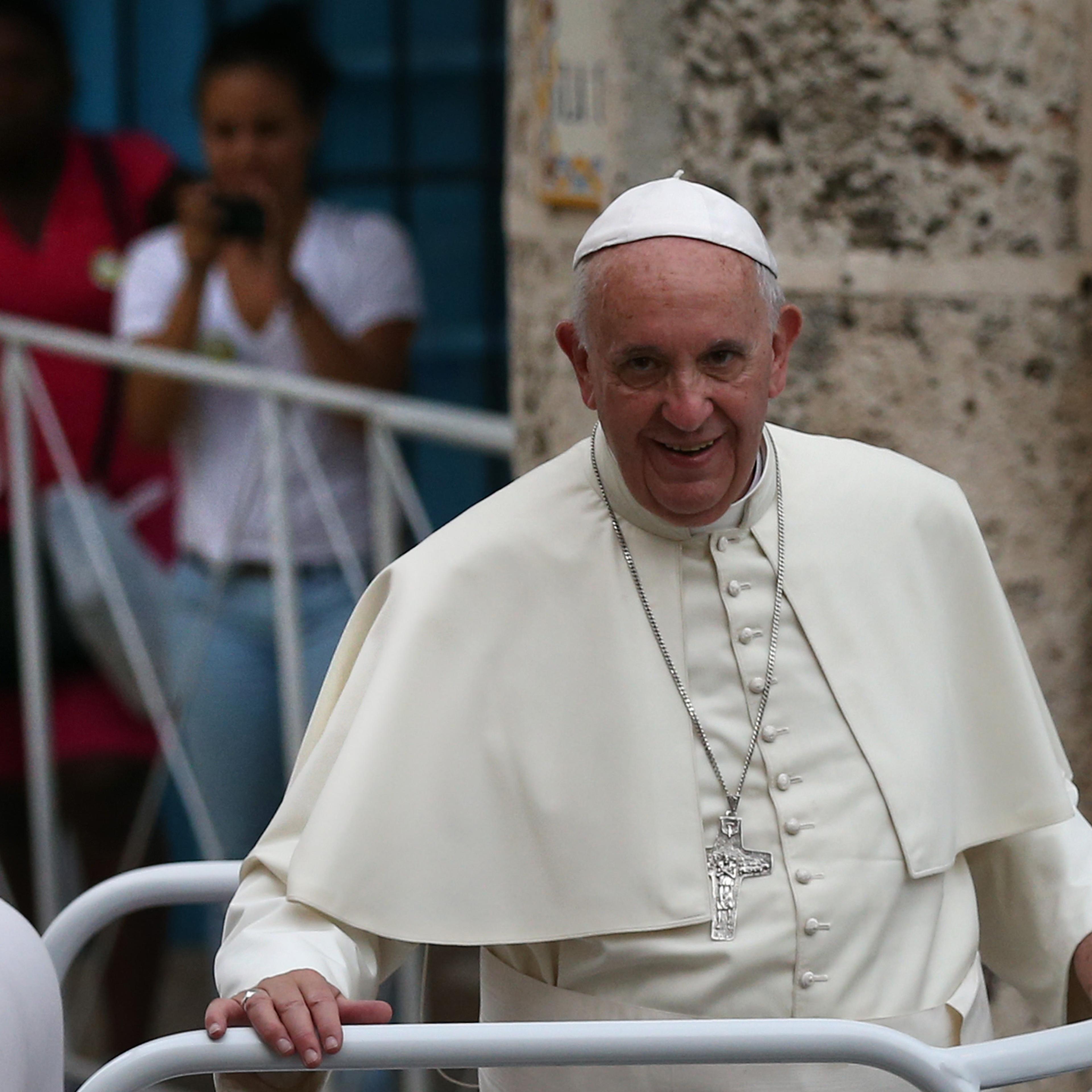 Pope Francis looks out from his Popemobile as he arrives at Havana Cathedral in Havana, Cuba on Sept. 20, 2015.