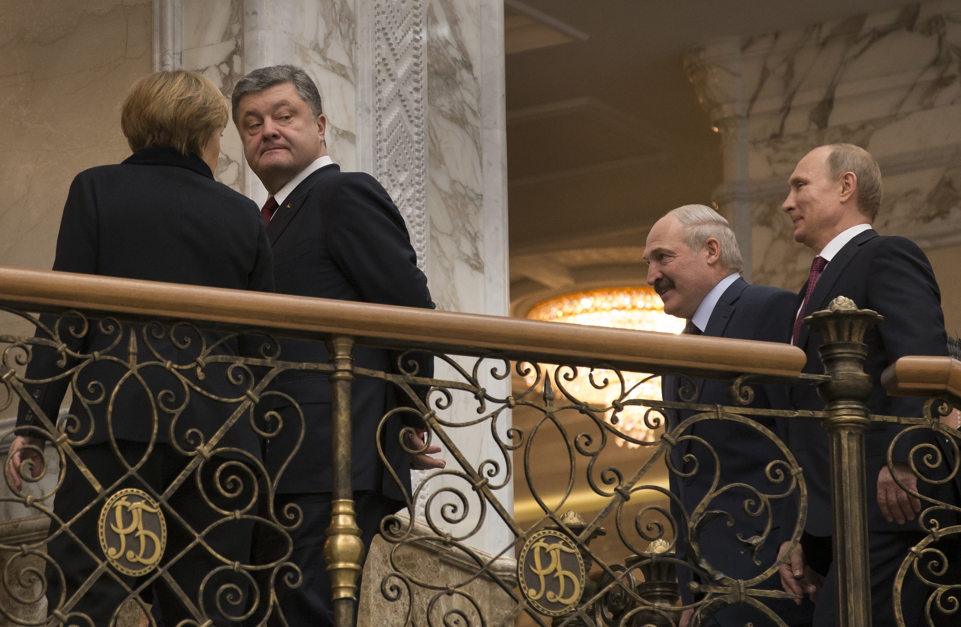 German Chancellor Angela Merkel, Ukrainian President Petro Poroshenko, Belarusian President Alexander Lukashenko, and Russian President Vladimir Putin, seen during peace talks in Minsk, Belarus on Feb. 11, 2015.