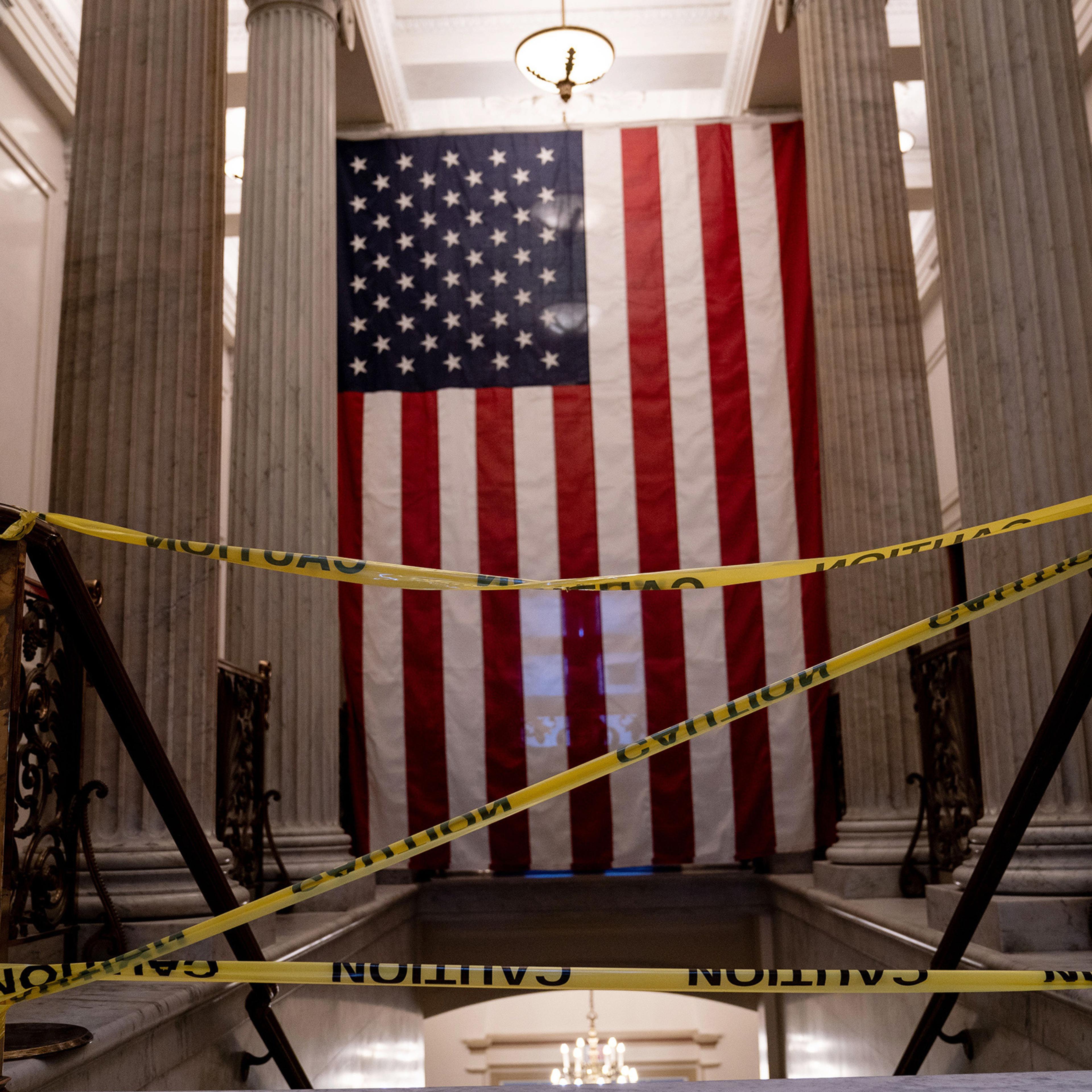 Caution tape blocks a stairwell inside the Capitol in Washington on Jan. 9