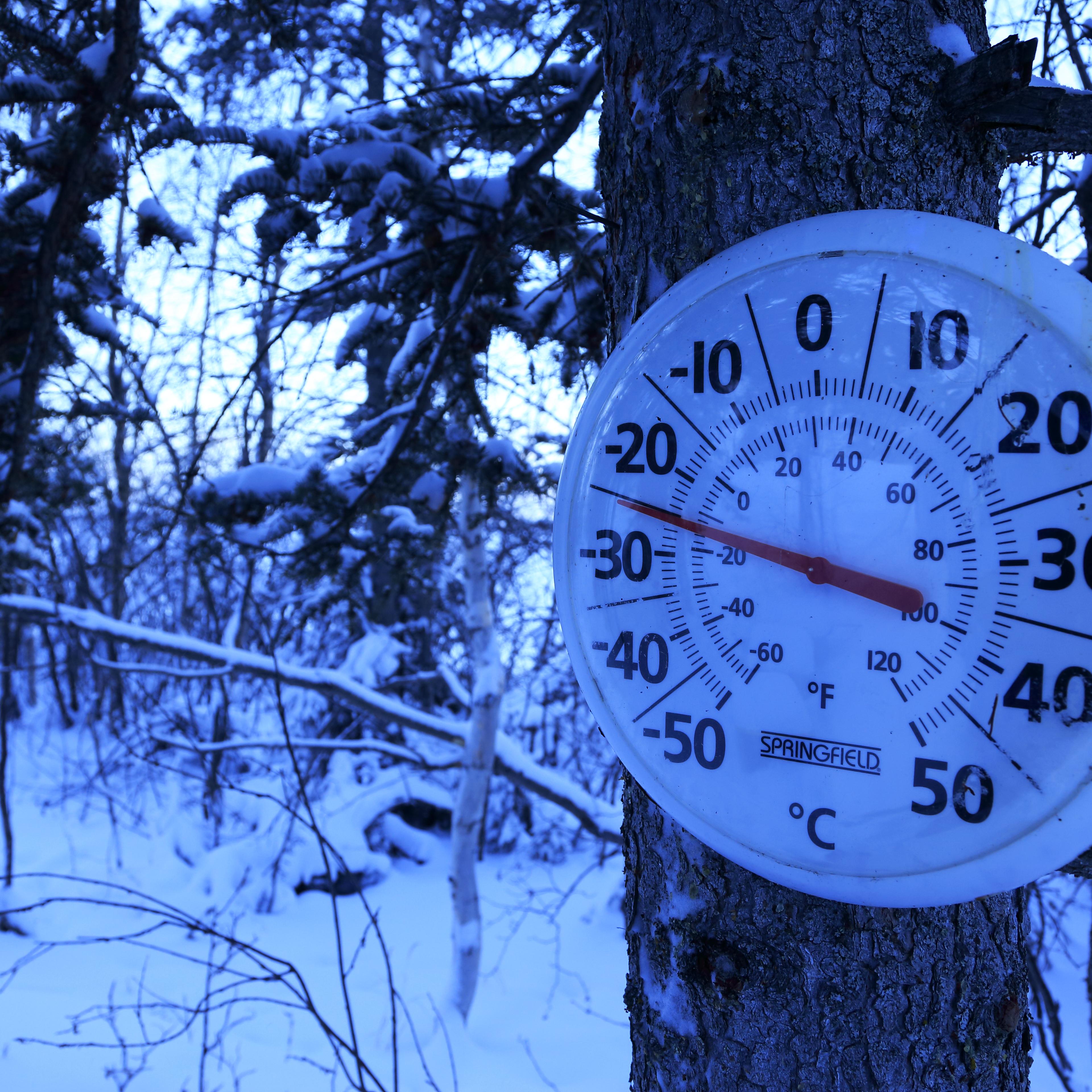A thermometer showing winter temperature