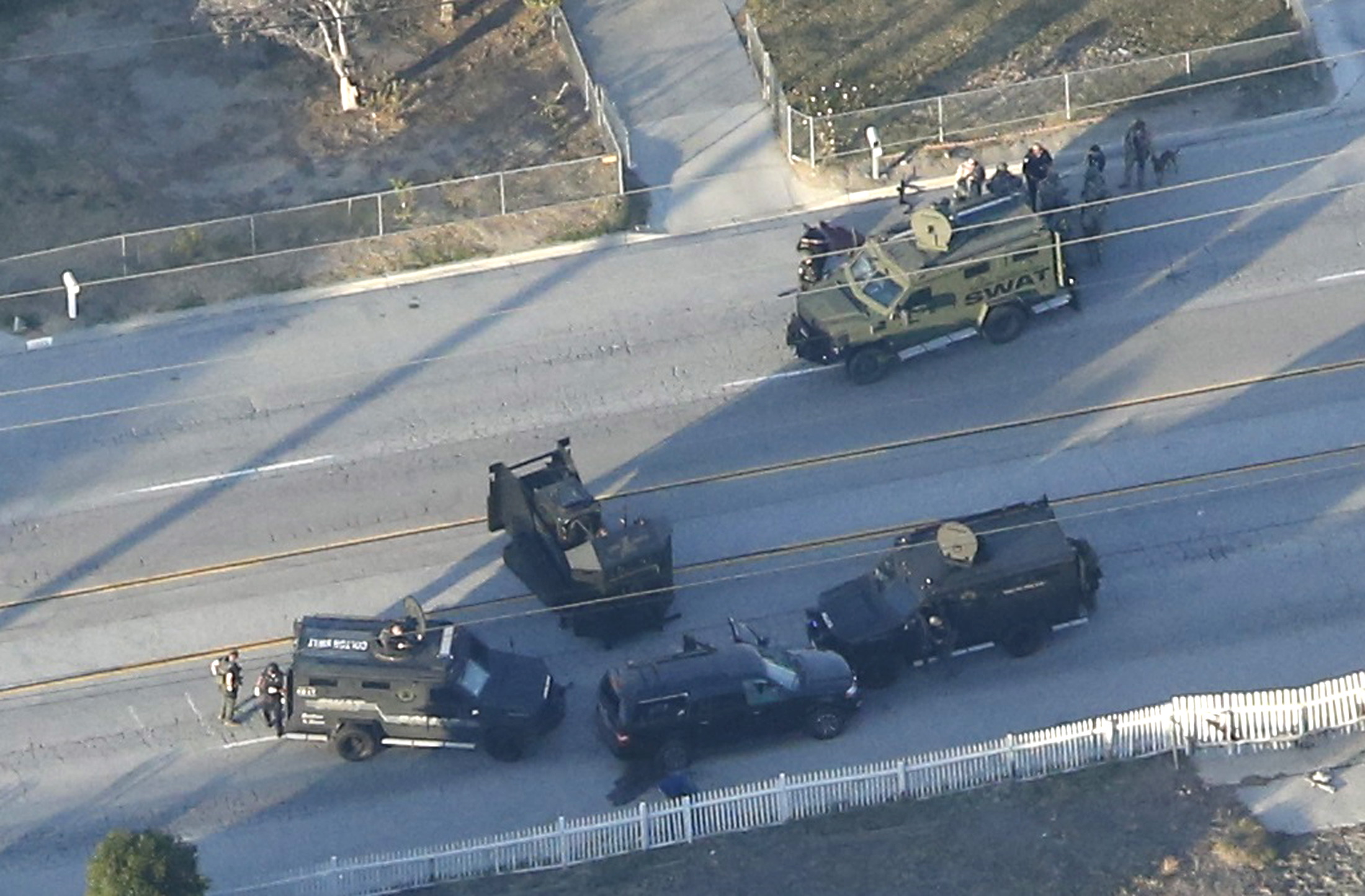 An SUV with its windows shot out that police suspect was the getaway vehicle from at the scene of a shooting in San Bernardino, California is shown in this aerial photo on Dec. 2, 2015.