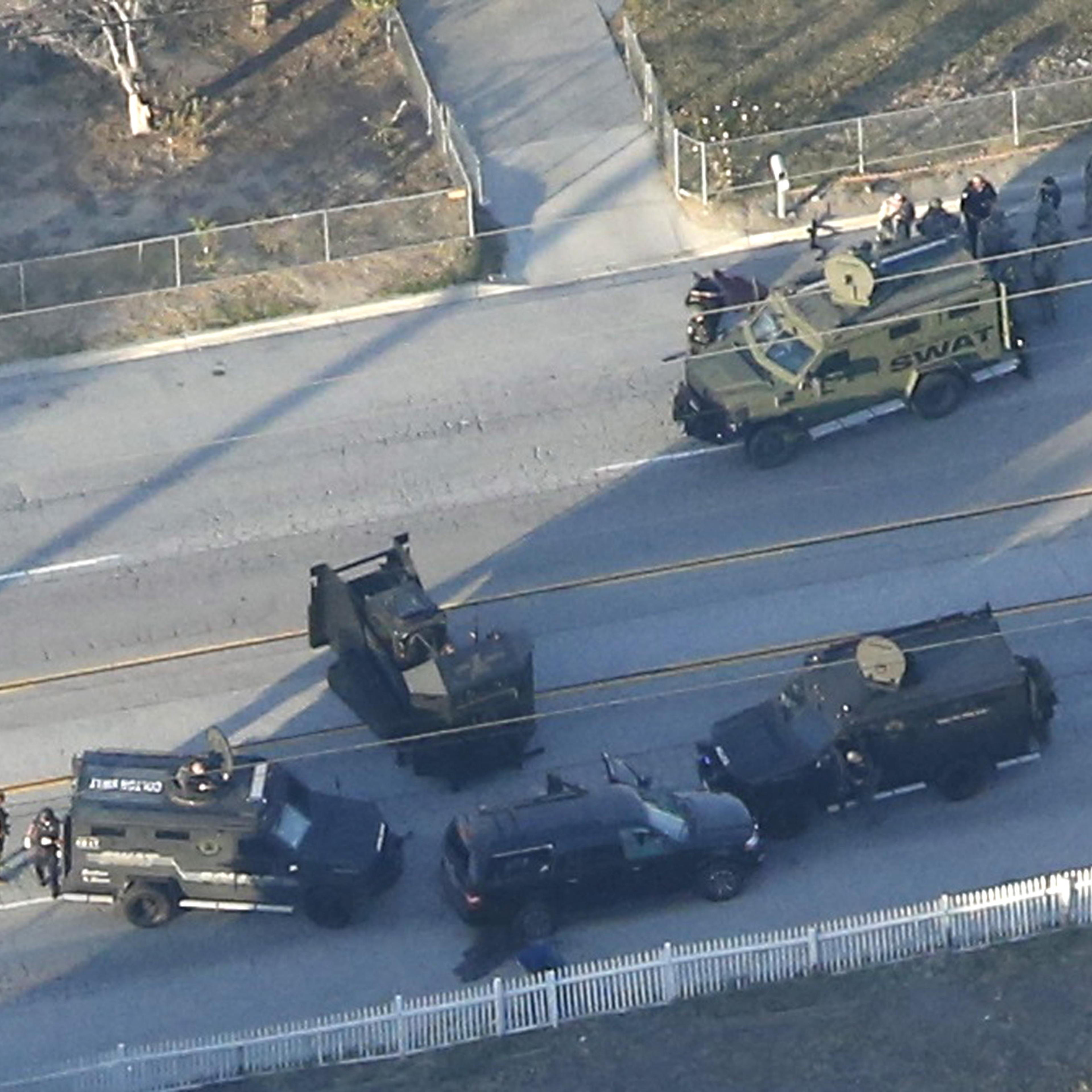 An SUV with its windows shot out that police suspect was the getaway vehicle from at the scene of a shooting in San Bernardino, California is shown in this aerial photo on Dec. 2, 2015.