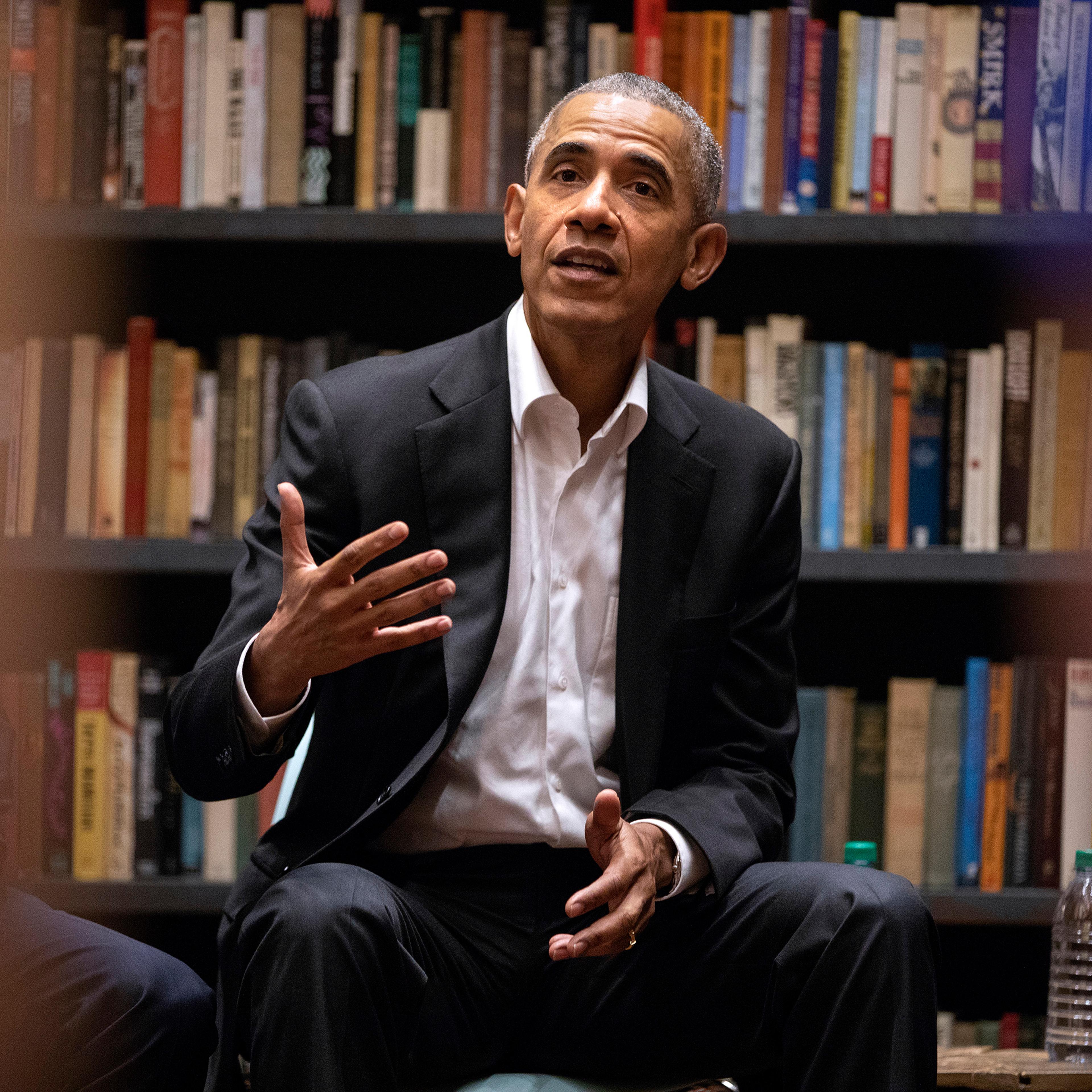 Obama fellows meet with former president