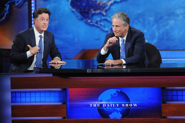Stephen Colbert and Jon Stewart appear on 'The Daily Show with Jon Stewart' #JonVoyage on August 6, 2015 in New York City.
