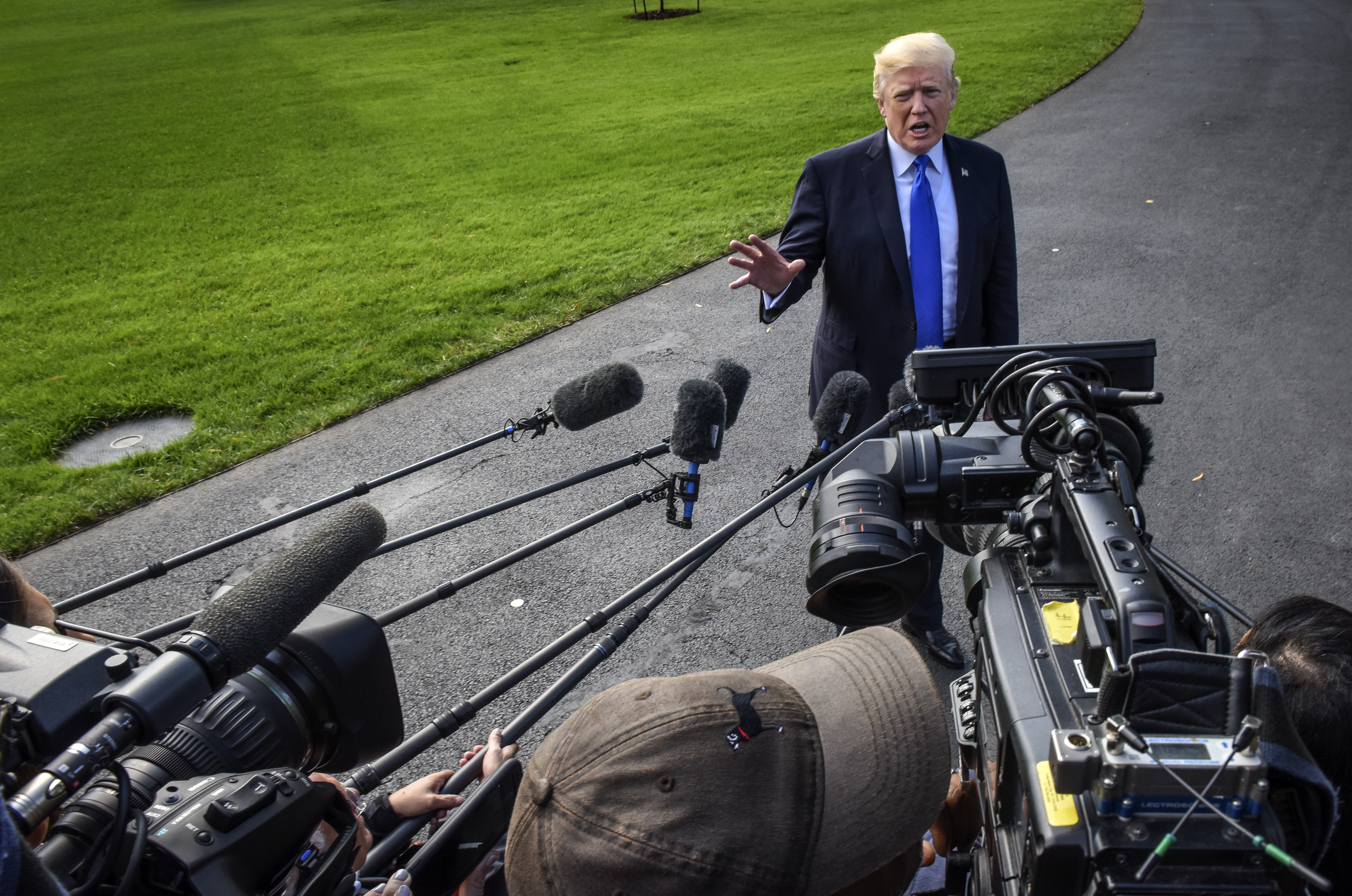 President Donald Trump departs for Texas to attend a briefing on hurricane relief efforts, in Washington, DC.