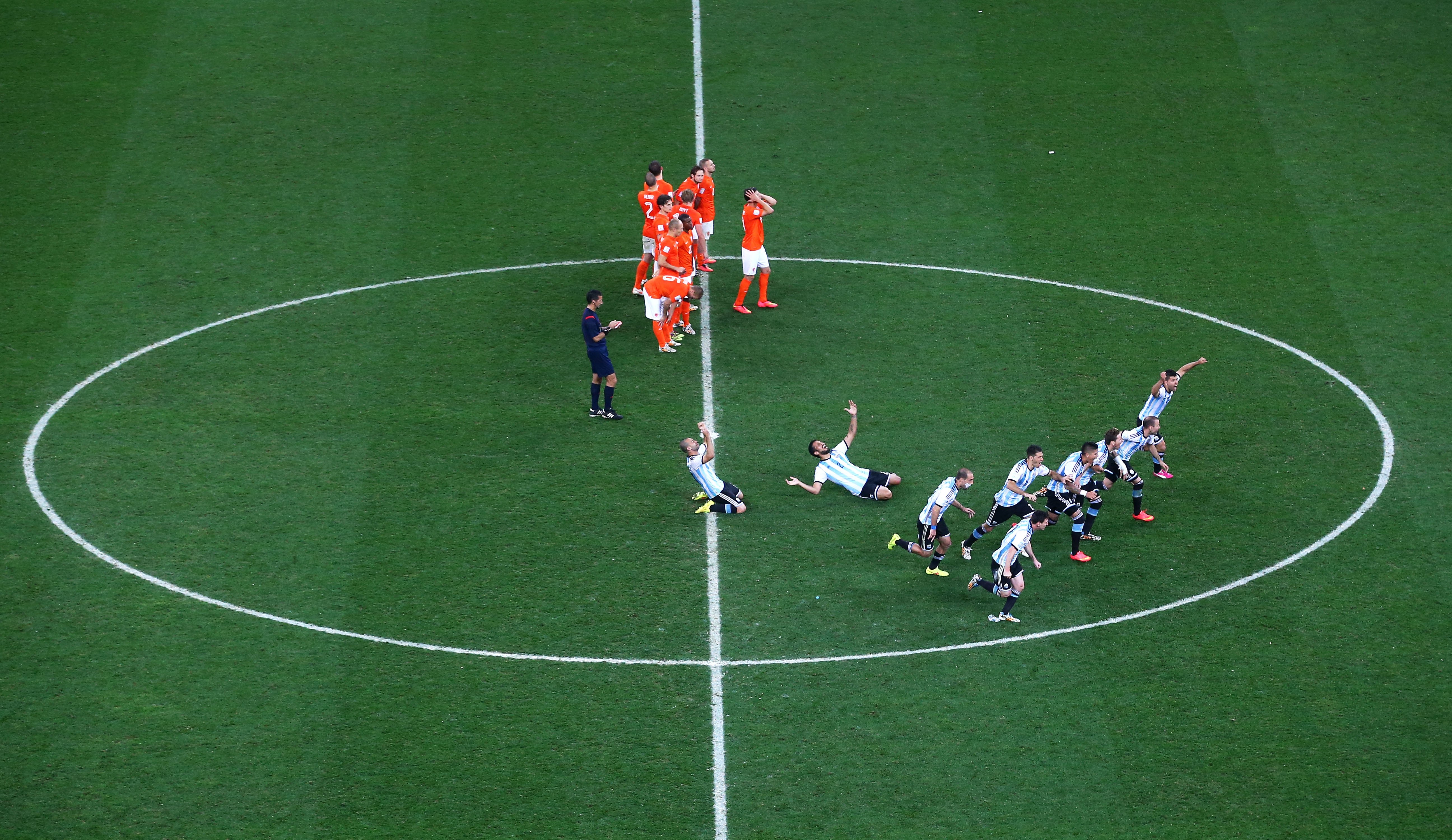 Argentina players celebrate defeating the Netherlands in a shootout at Arena de Sao Paulo on July 9, 2014 in Sao Paulo.