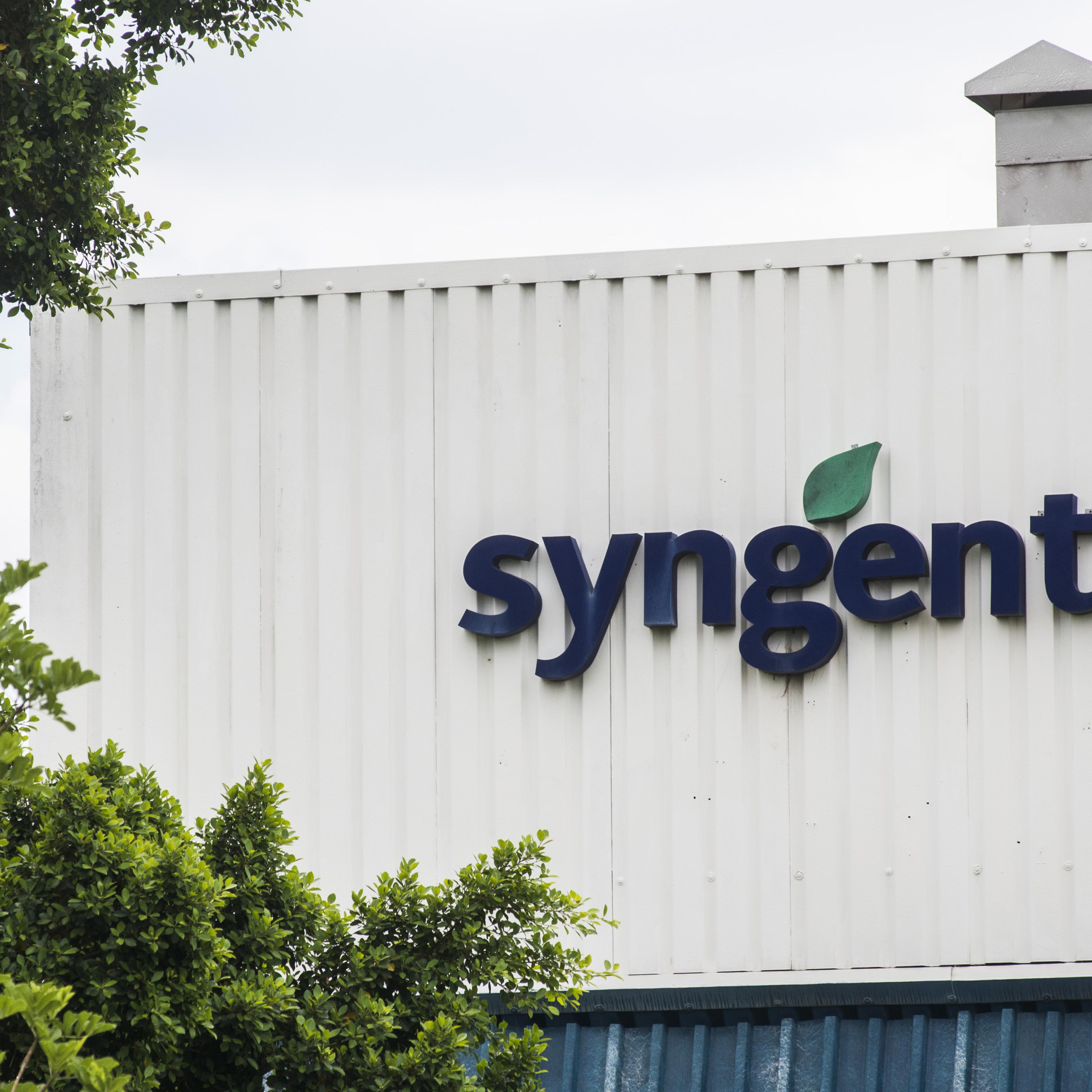 A logo sits on display outside the Syngenta AG plant in Brits, South Africa, on Wednesday, Feb. 3, 2016.