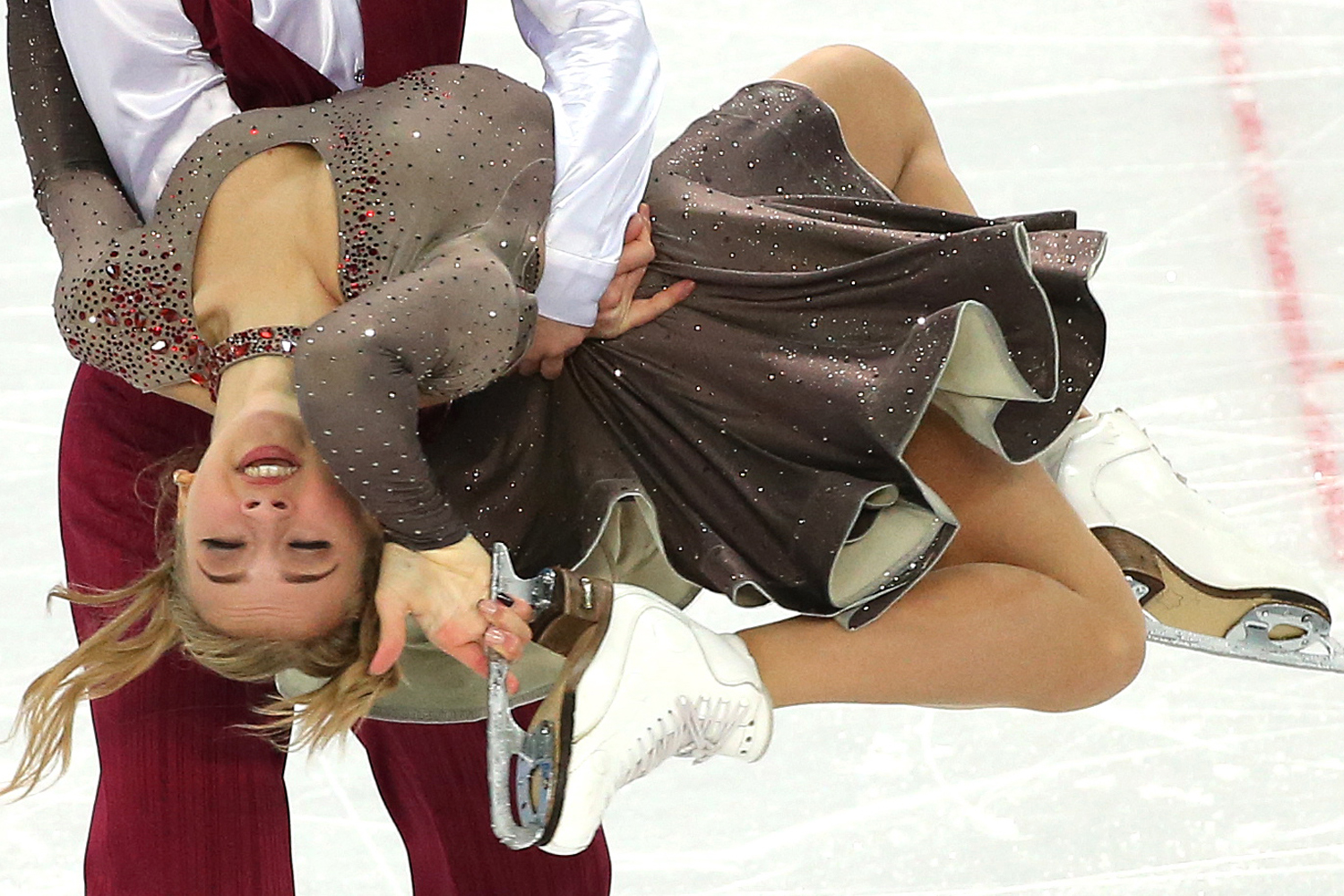 Victoria Sinitsina and Ruslan Zhiganshin of Russia perform during the Ice Dance Short Dance of the Figure Skating event at the Iceberg Palace during the Sochi 2014 Olympic Games, Sochi, Russia, Feb. 16, 2014.