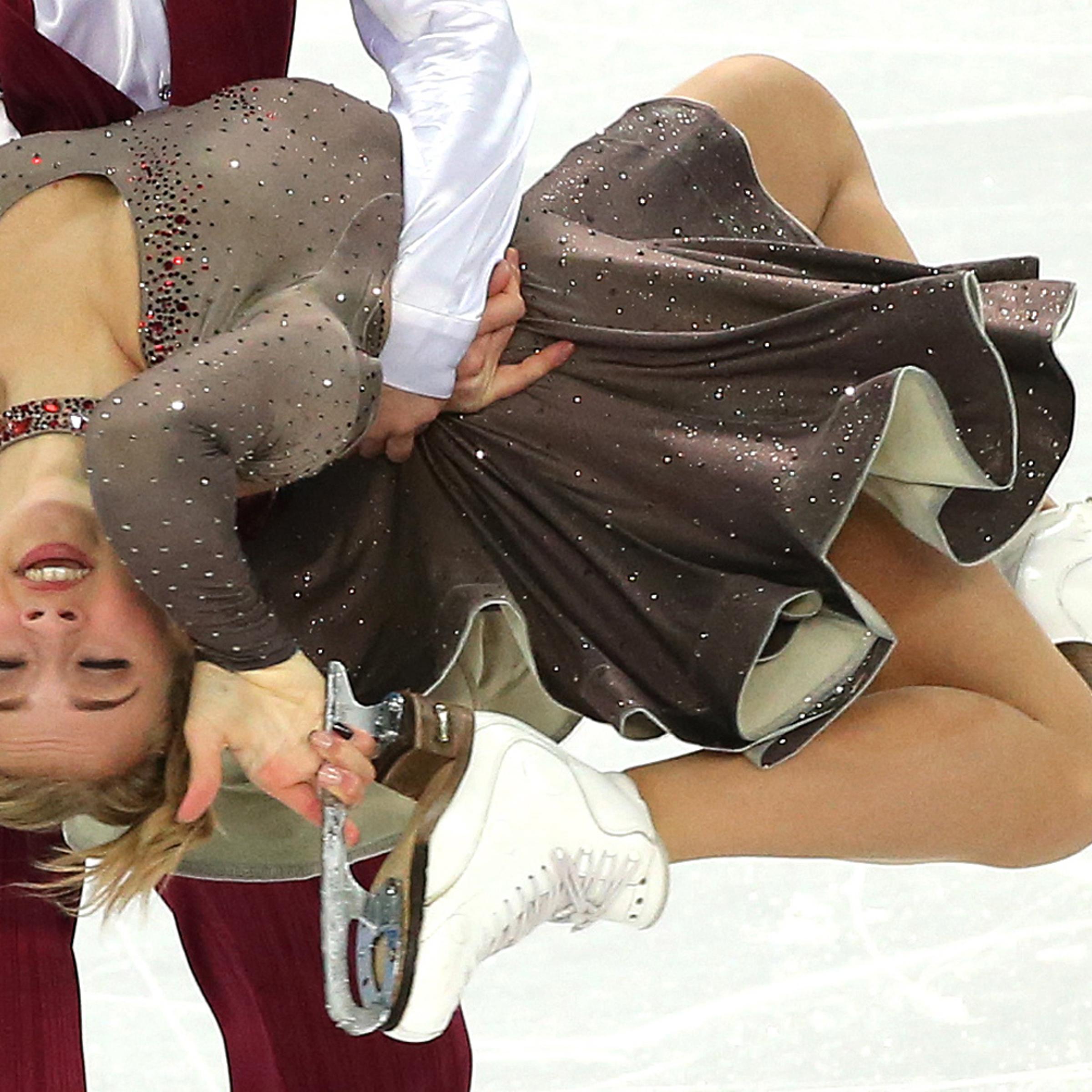 Victoria Sinitsina and Ruslan Zhiganshin of Russia perform during the Ice Dance Short Dance of the Figure Skating event at the Iceberg Palace during the Sochi 2014 Olympic Games, Sochi, Russia, Feb. 16, 2014.