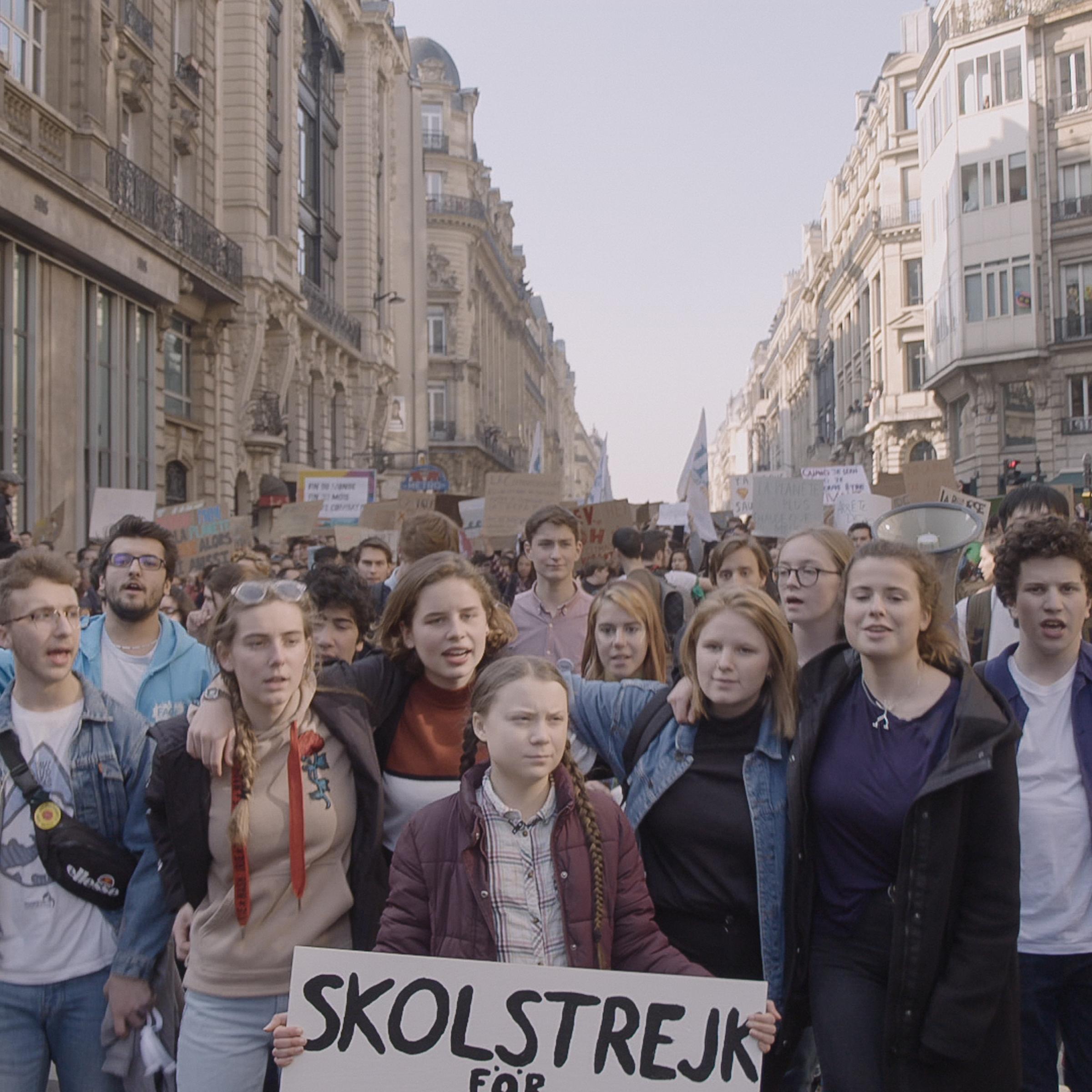 Greta Thunberg participating in a climate strike in I AM GRETA