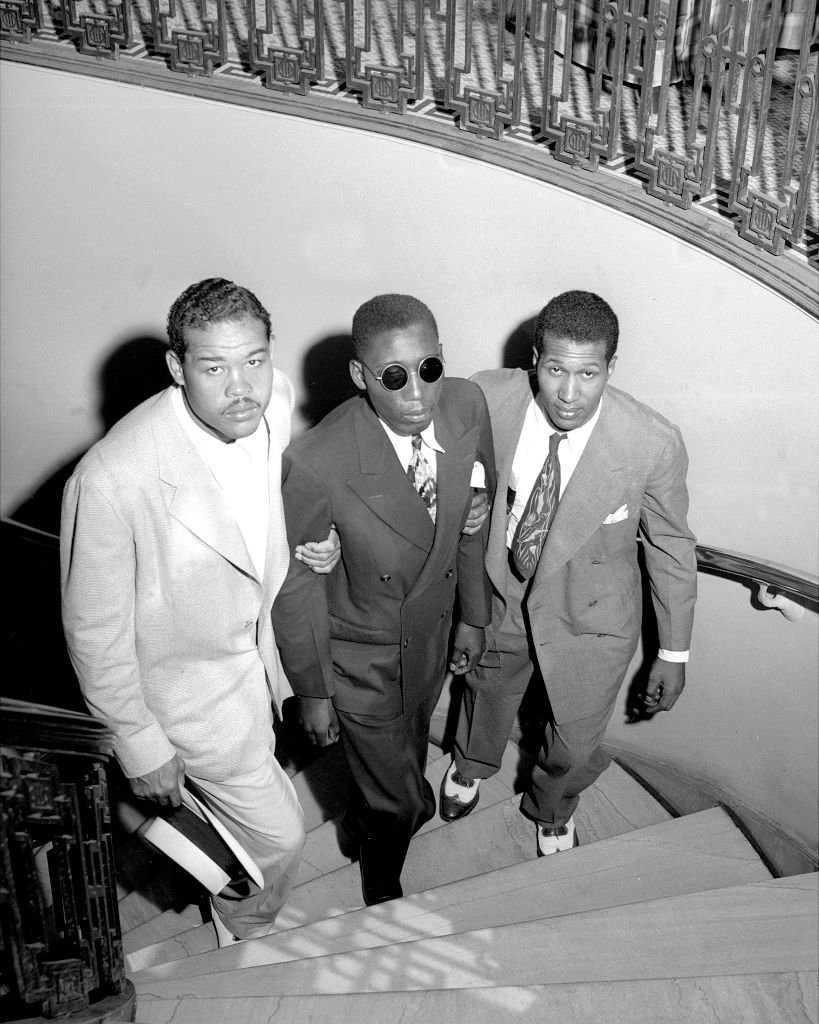 Joe Louis, Neil Scott, and Isaac Woodard