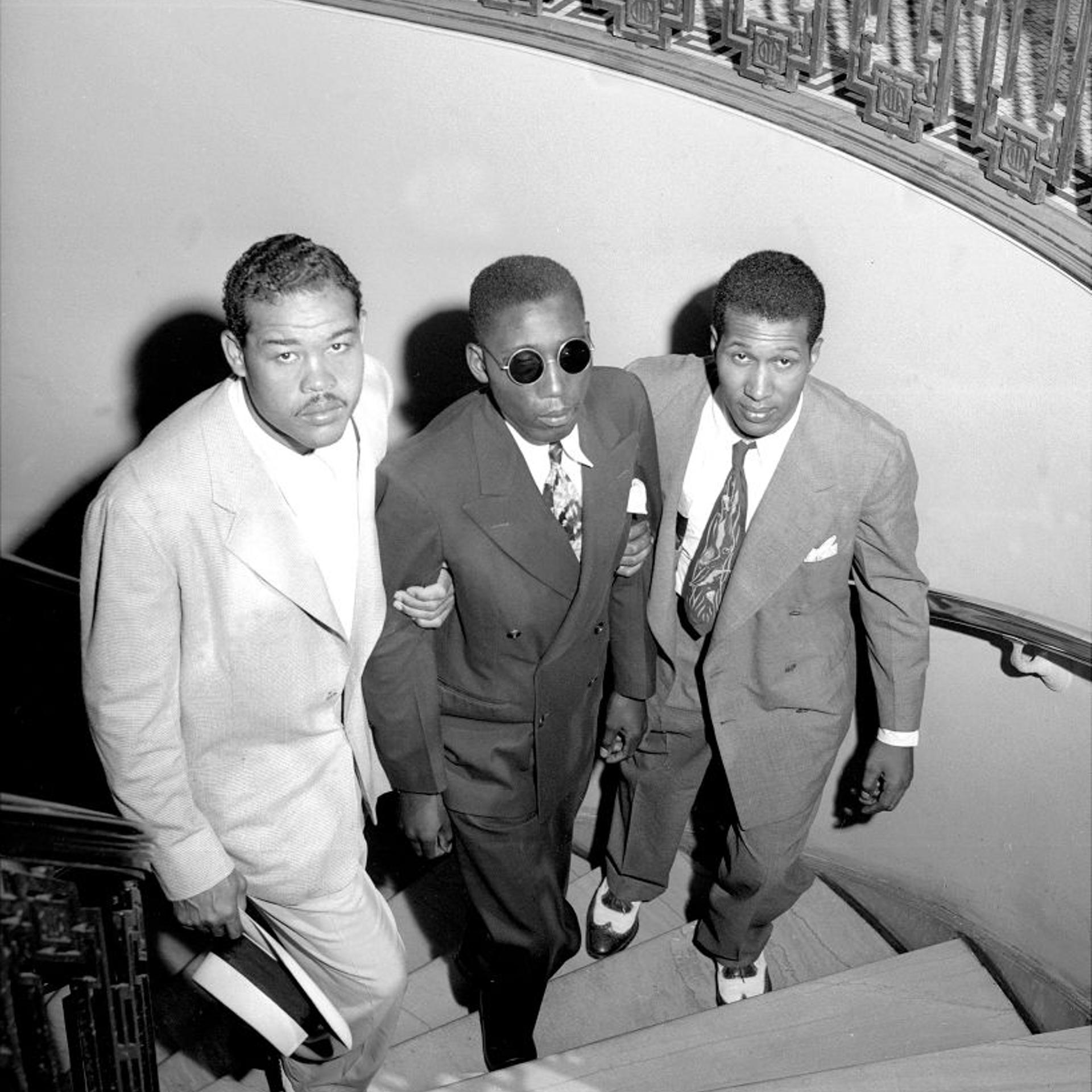 Joe Louis, Neil Scott, and Isaac Woodard