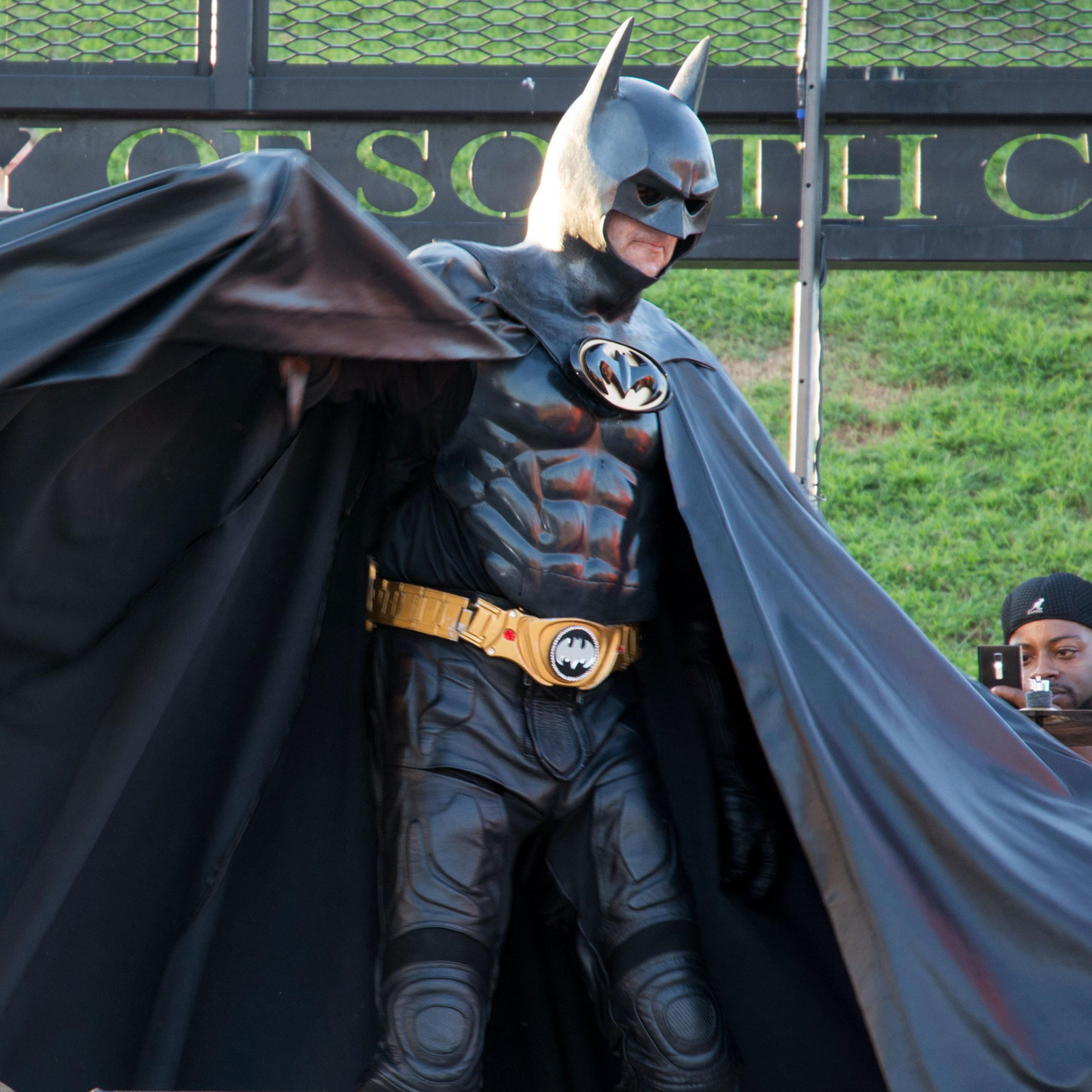 In this Aug. 15, 2015 photo provided by Linda Weekley, Leonard Robinson performs at SummerFest in South Charleston, W.Va. The Maryland man who delighted thousands of children by impersonating Batman at hospitals and charity events died when he was hit by