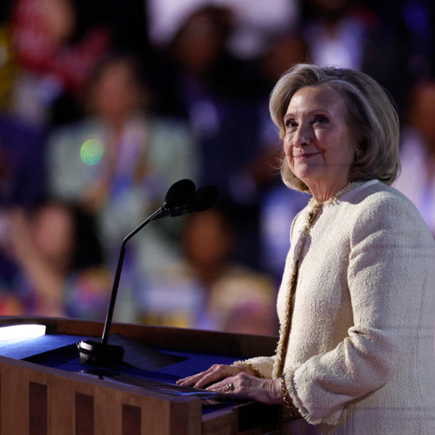 Former U.S. Secretary of State Hillary Clinton looks on as she is applauded after arriving on stage to speak on the first day of the Democratic National Convention (DNC) at the United Center in Chicago, Illinois, on August 19, 2024.