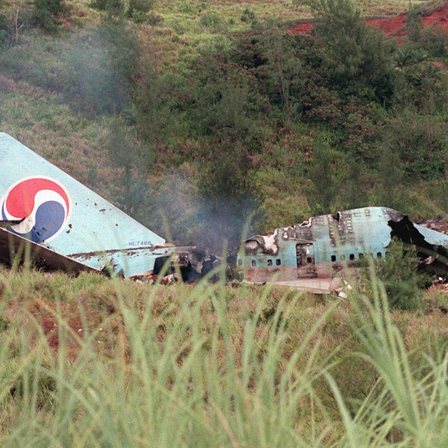 Smokes rises from wreckage of South Korean Air Boeing 747 at the crash site at Agana in Guam on August 6, 1997.
