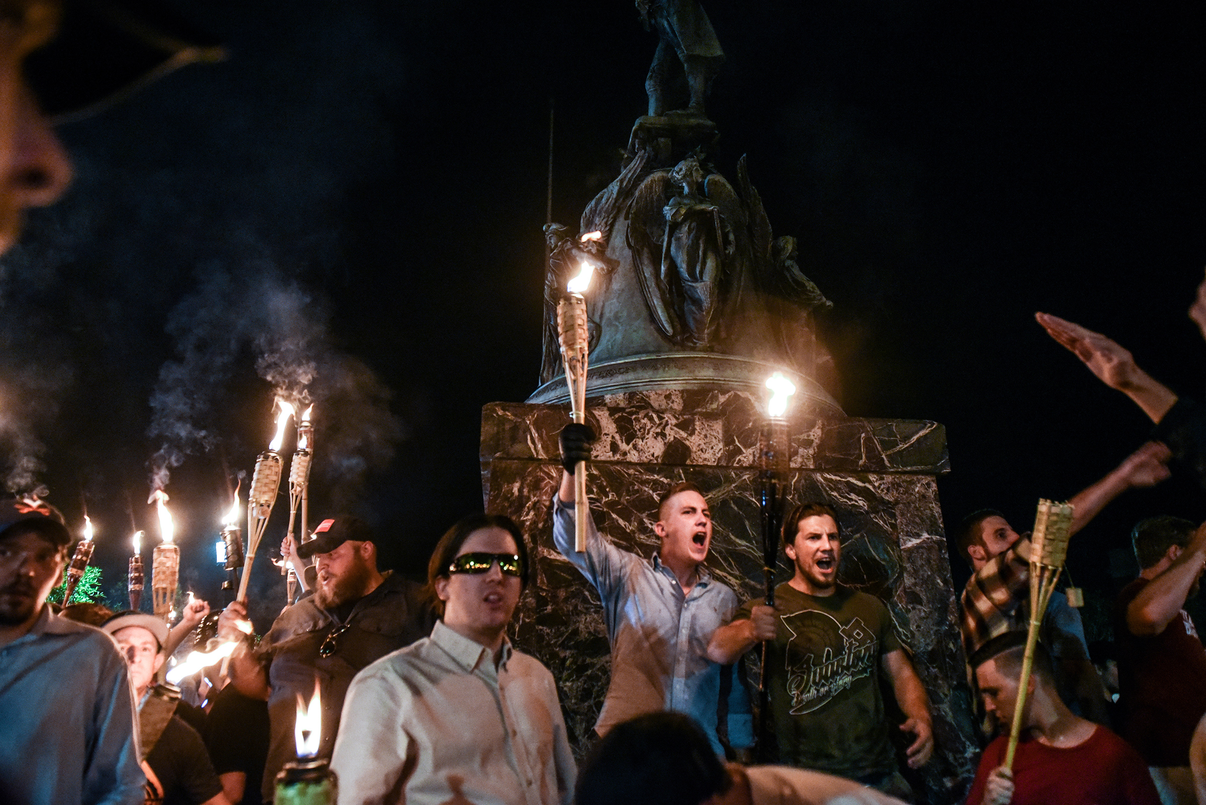 White nationalists participate in a torch-lit march on the grounds of the University of Virginia ahead of the Unite the Right Rally in Charlottesville, Aug. 11, 2017. 