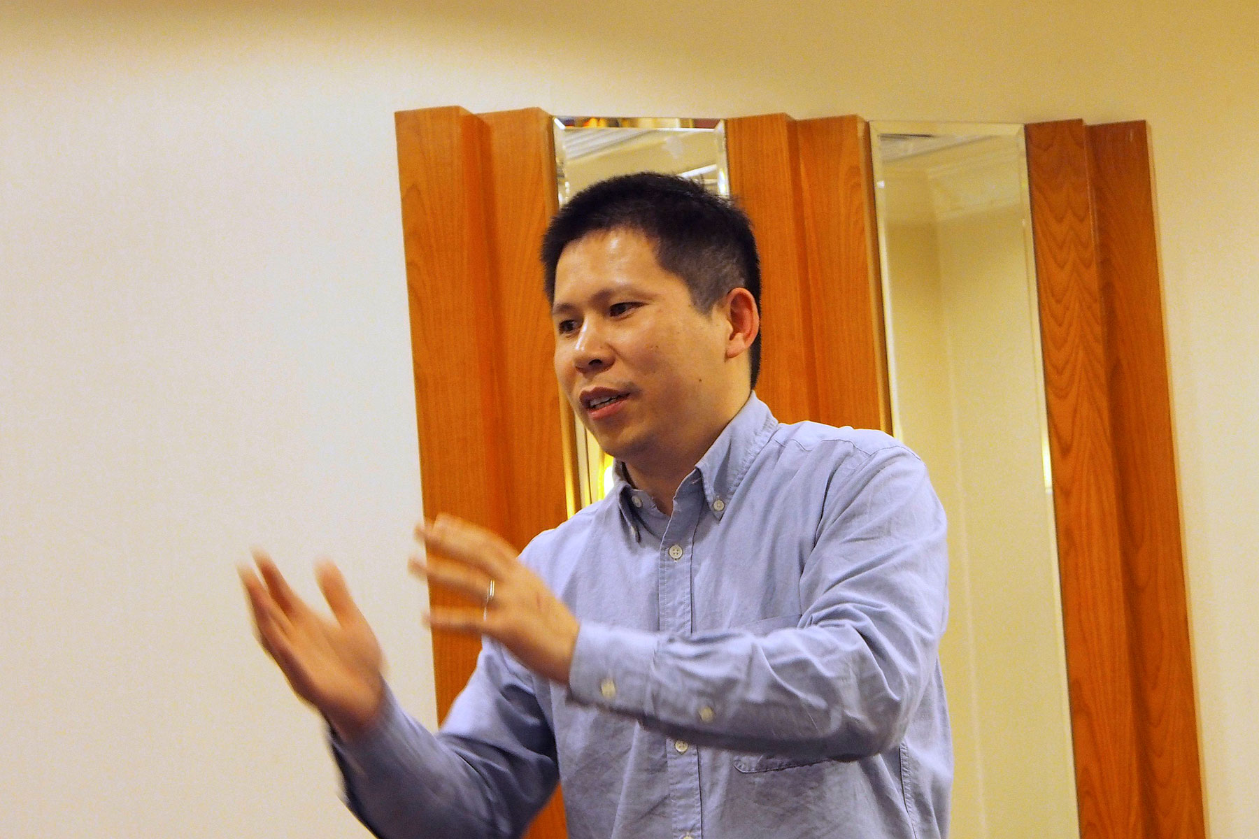 Chinese rights advocate Xu Zhiyong speaks during a meeting in Beijing in this handout photo dated March 30, 2013