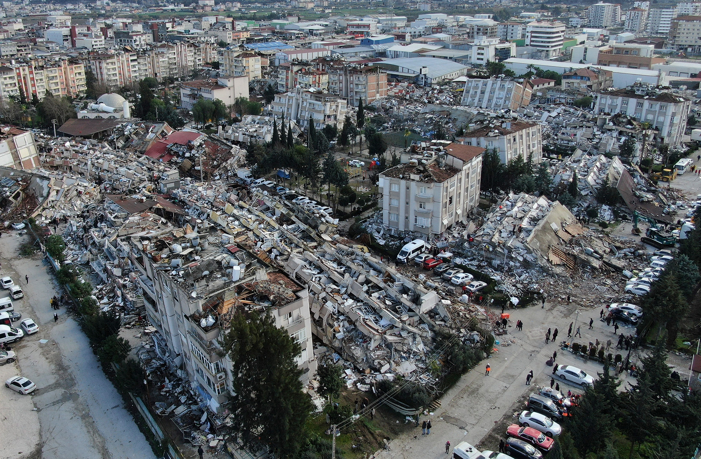 Aerial photo shows collapsed buildings and destruction in Hatay, Turkey, on Feb. 7.