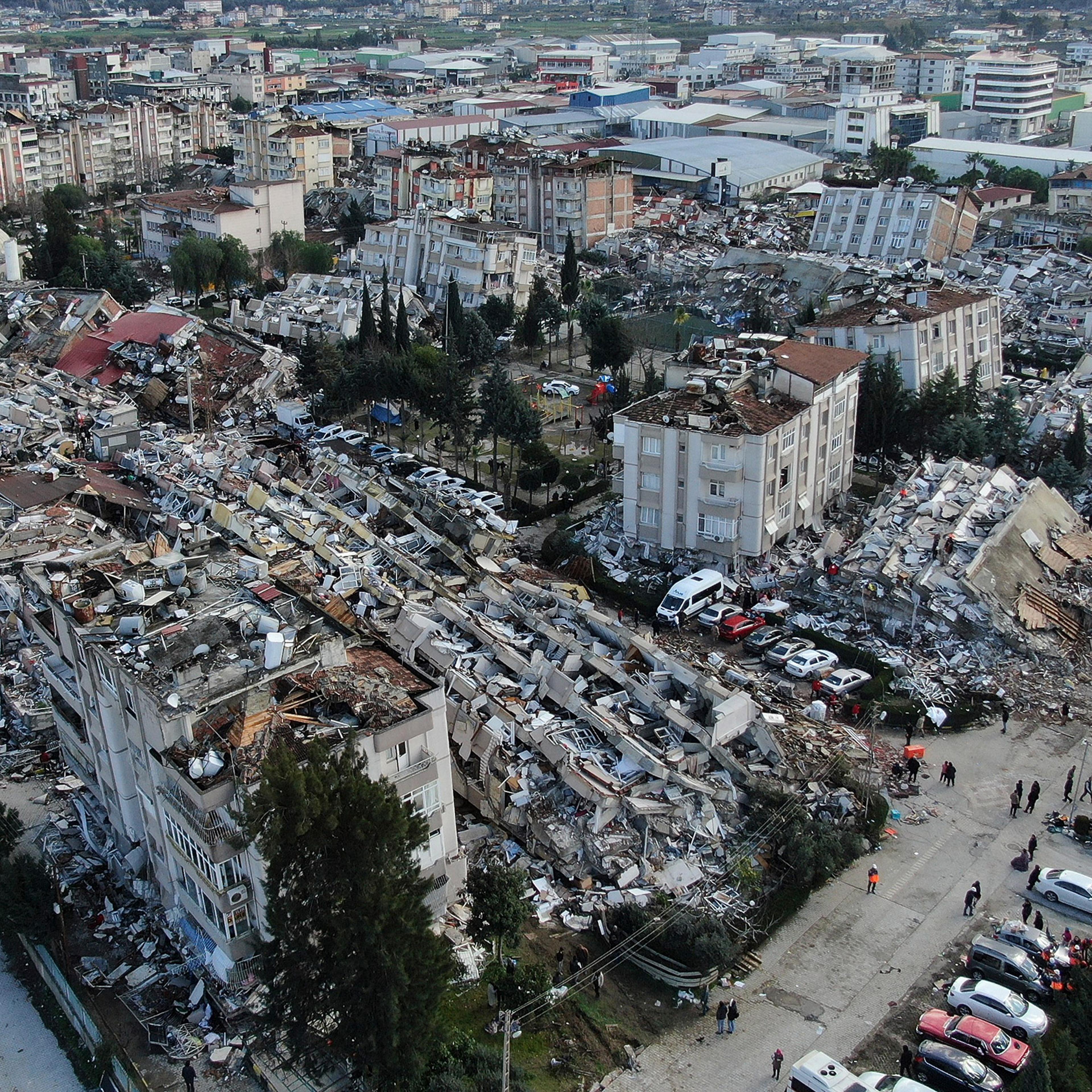 Aerial photo shows collapsed buildings and destruction in Hatay, Turkey, on Feb. 7.