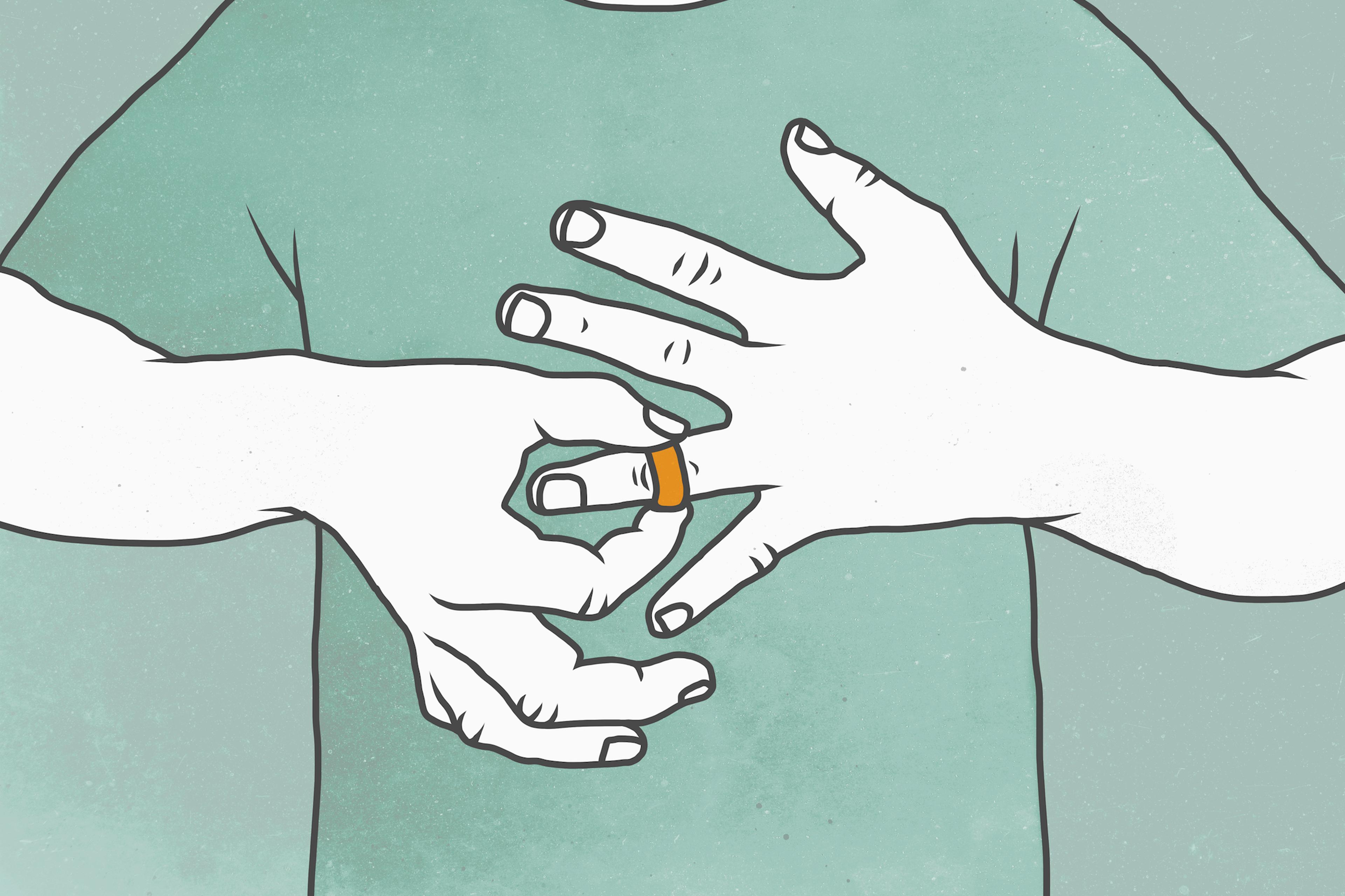 Man removing wedding ring
