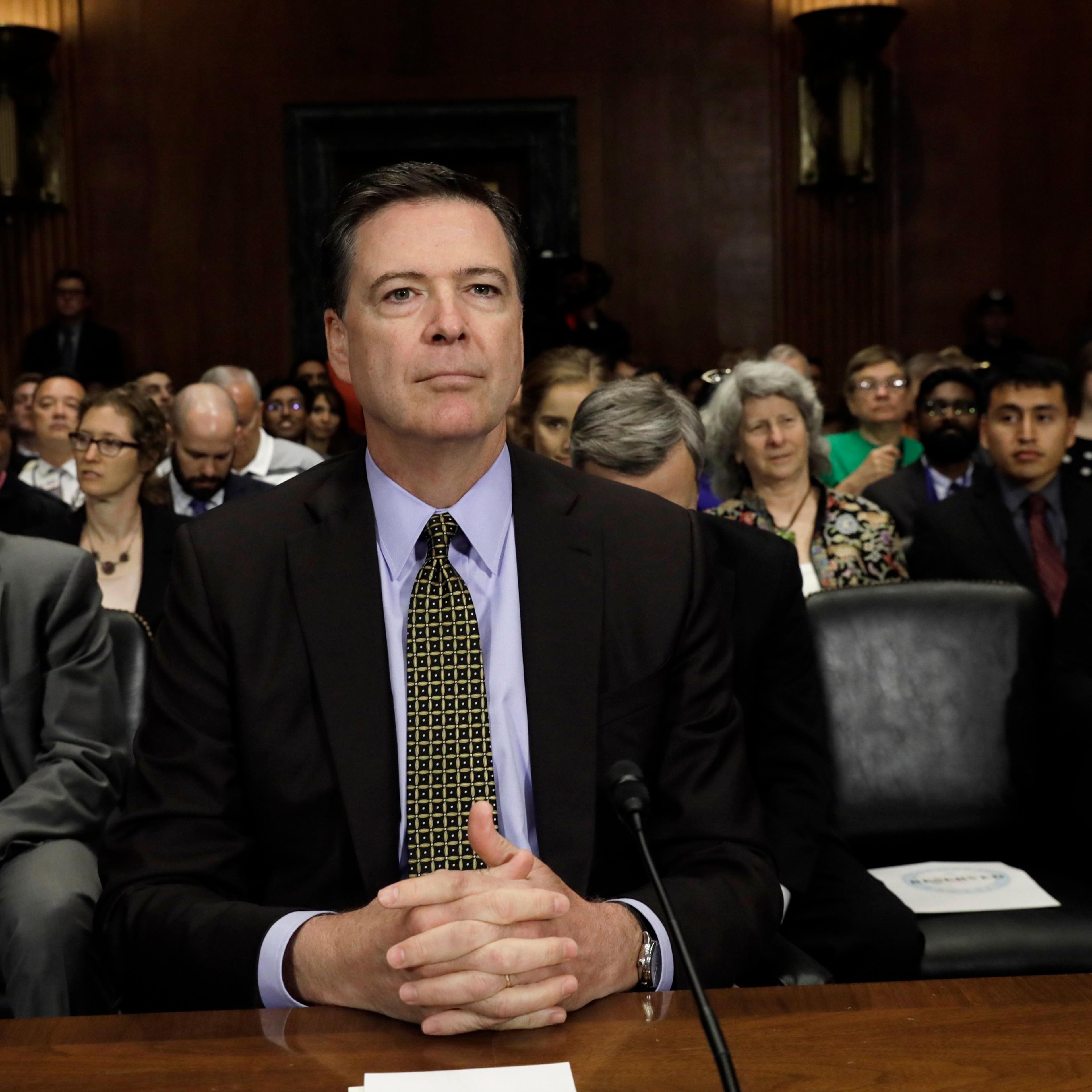 FBI Director Comey prepares to testify at a Senate Judiciary Committee hearing on Capitol Hill in Washington