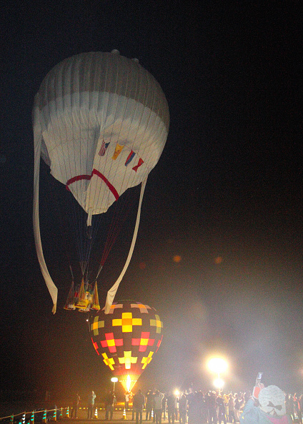 A hot-air balloon of the U.S. balloonist Troy Bradley and Russian Leonid Tiukhtyaev soars in Saga, Japan, on Jan. 25, 2015