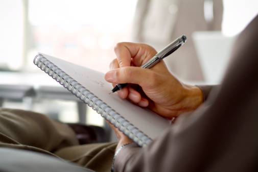 man-notebook-writing-pen