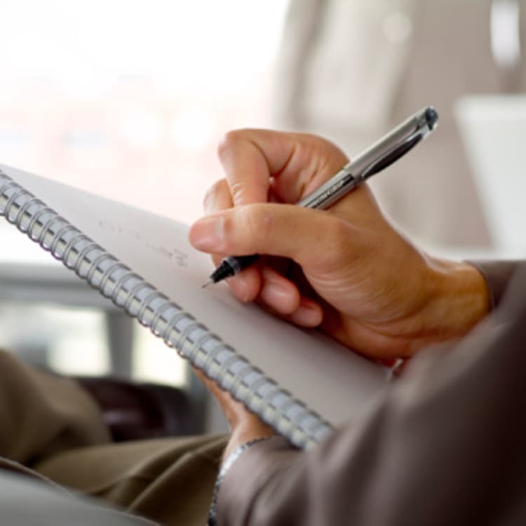 man-notebook-writing-pen