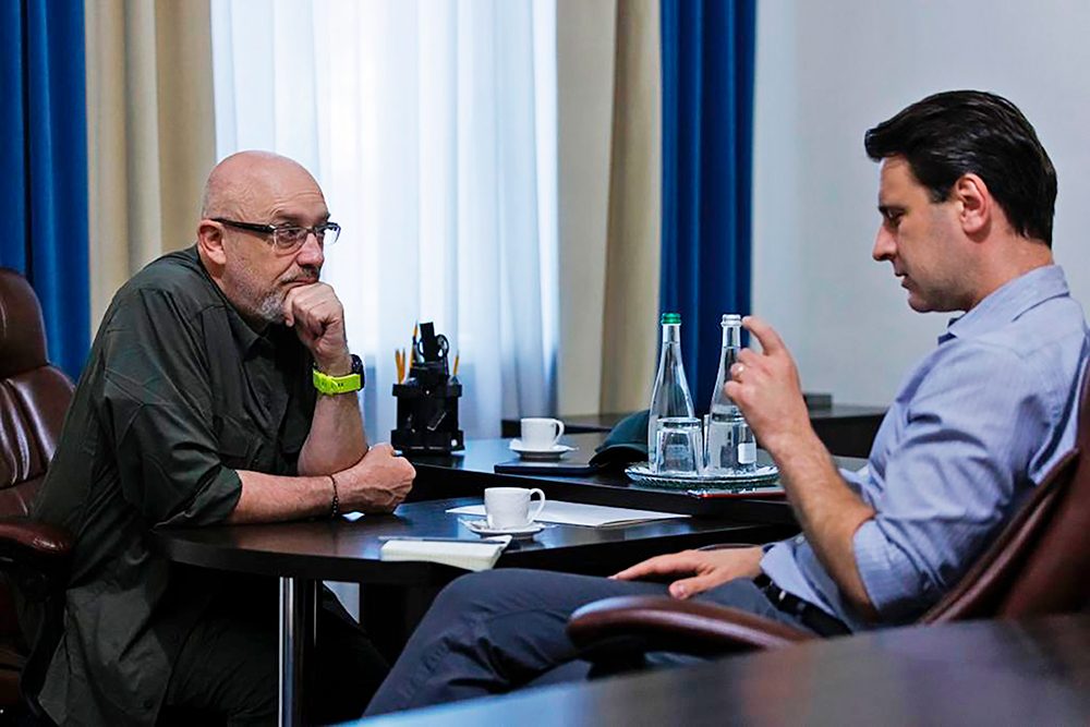 Ukraine’s Oleksiy Reznikov, left, with TIME’s Simon Shuster in June
