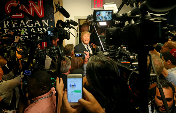 Republican presidential candidate Donald Trump speaks with reporters after the presidential debate at the Reagan Library on September 16, 2015 in Simi Valley, California.
