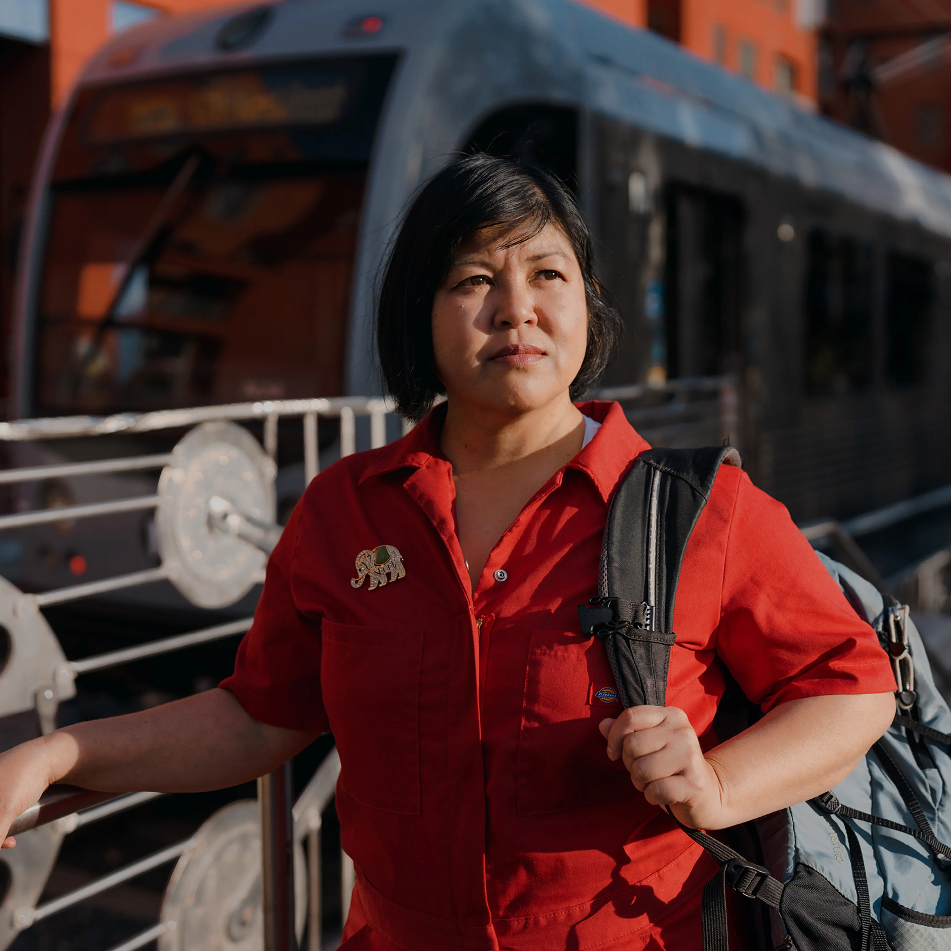 Tanny Jiraprapasuke stands at a Metro Gold Line station in Pasadena, Calif., on March 13, 2022.