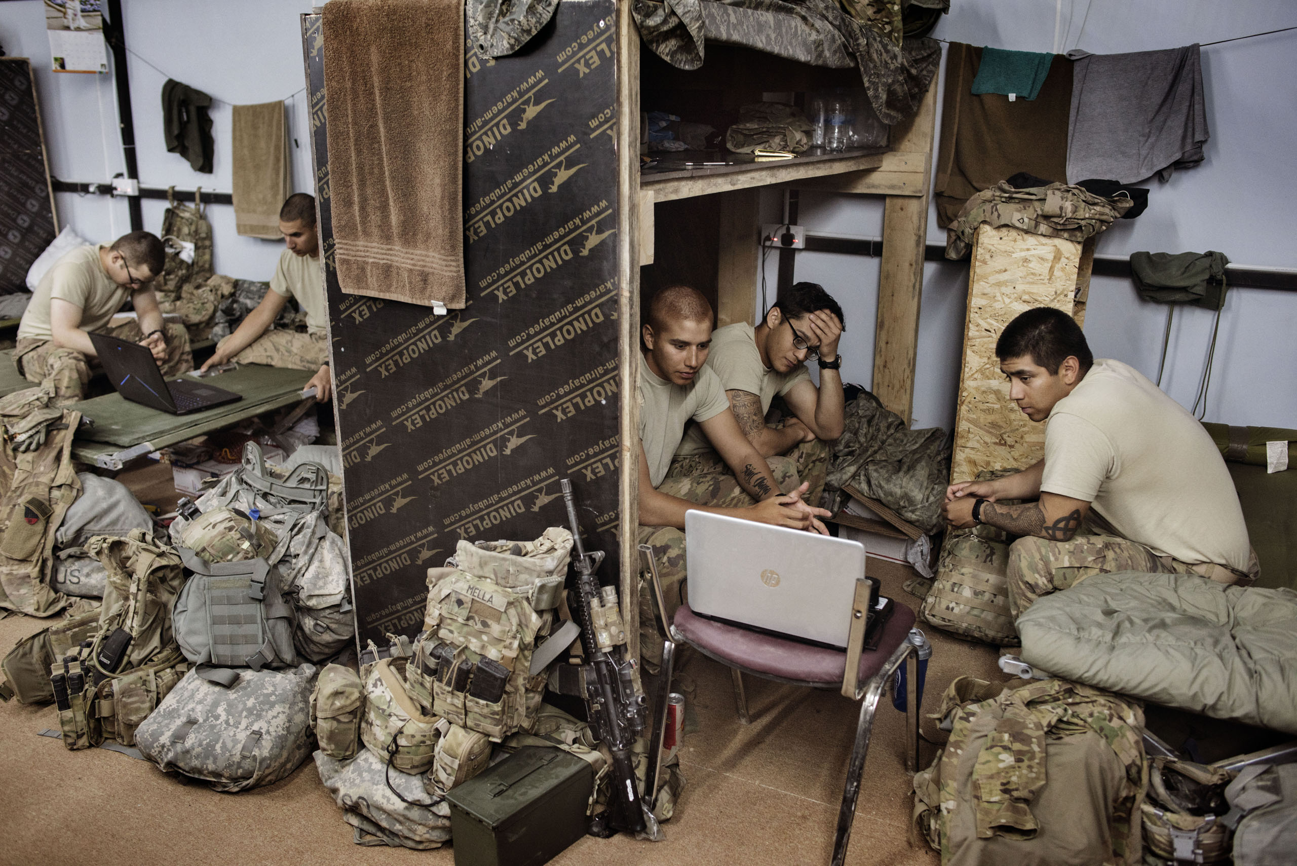 Members of the U.S. Army relax inside a makeshift barracks at Camp Swift, a U.S. forward base near the Iraqi town of Makhmour, Iraq, May 17, 2016. As of April, at least 4,087 U.S. military personnel were deployed in Iraq, many of them backing Iraqi force