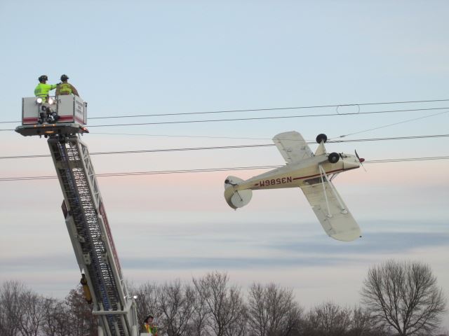 A single-engine Piper Cub propeller plane