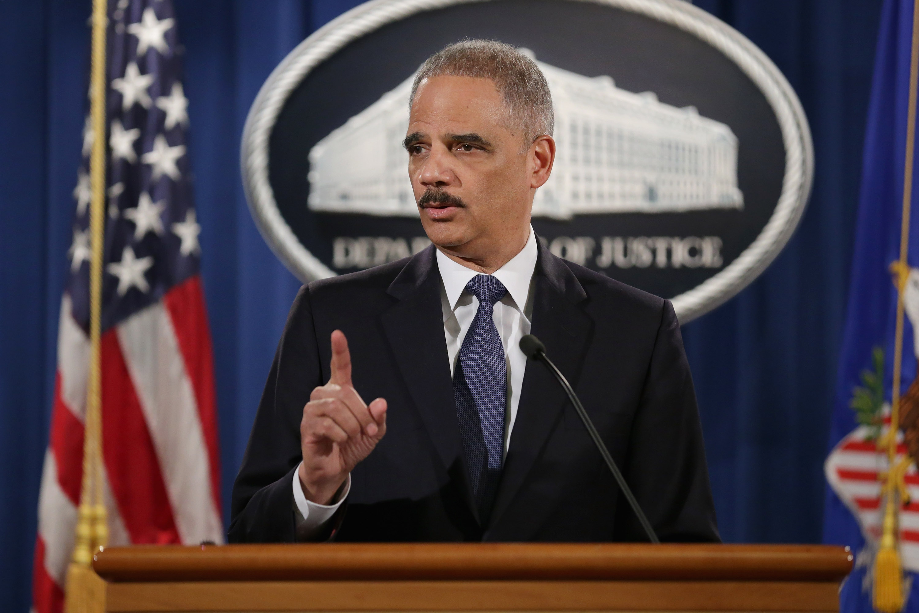Attorney General Eric Holder delivers remarks about the Justice DepartmentÕs findings related to two investigations in Ferguson, Missouri, at the Robert F. Kennedy Department of Justice Building March 4, 2015 in Washington, DC. Holder delivered the remar
